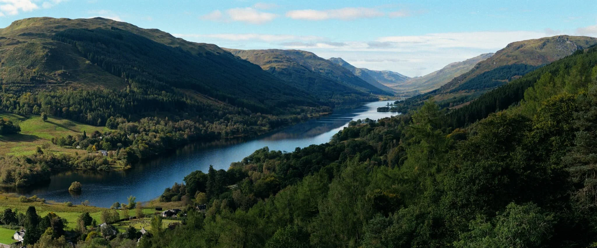  A short 250 m hike above the village of Balquhidder, one can climb above the Glen Kirkton forest to summit  Creag an Tuirc  and find one of finest views in all of Scotland. The entirety of the Balquhidder Glen, with its two lochs and many peaks, lays before you. Absolutely stunning. 