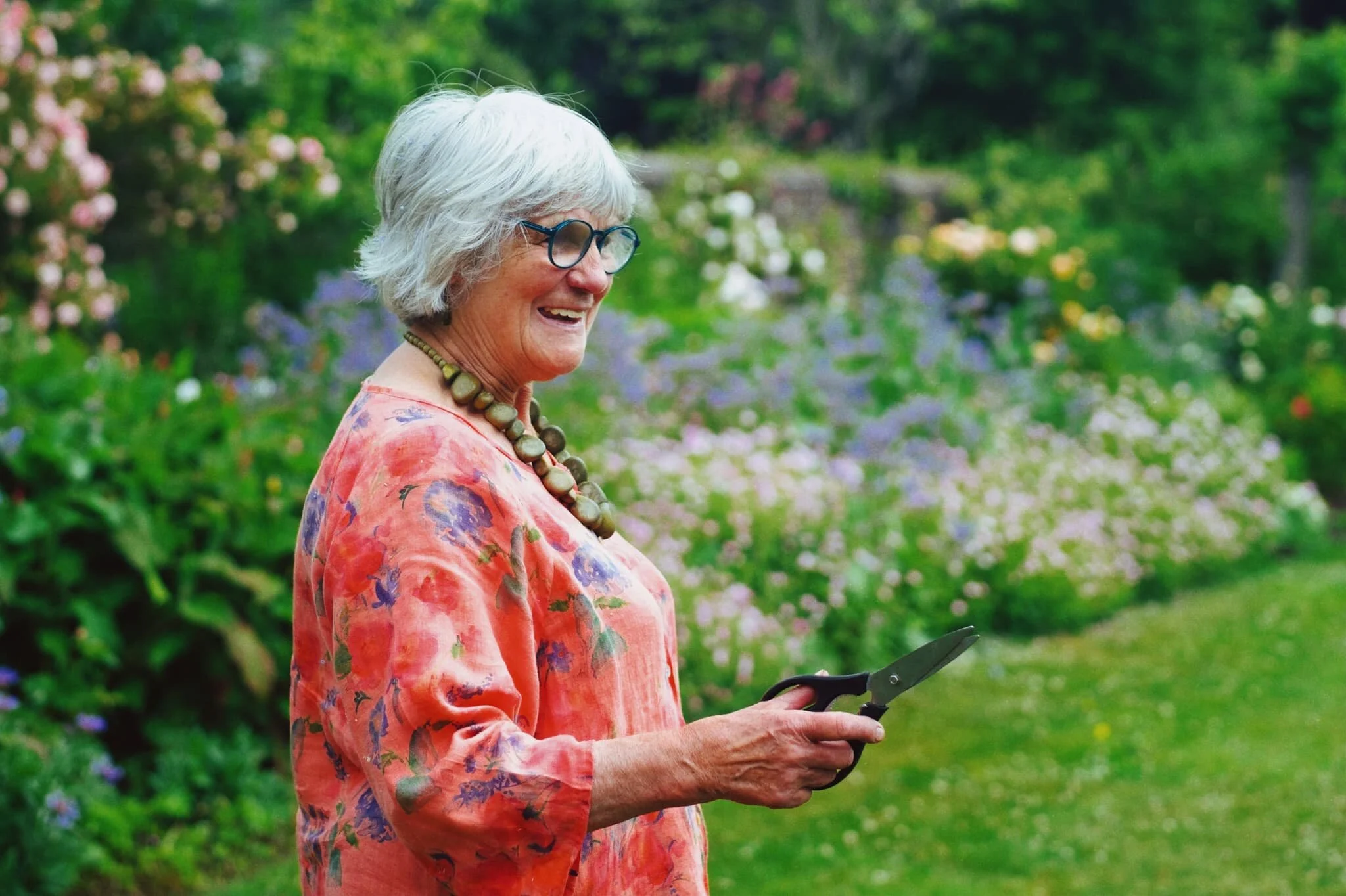  Story time! As we made our way back through Berwick town, we stopped outside someone&rsquo;s house to admire their front garden filled with flowers. Lisabet took some photos. As she did, an old gentleman enquired approached us to ask about our activity. After learning we were just admiring his garden, he simply invited us through to their back garden, which was even more fecund and filled with all sorts of flowers and vegetables. The &ldquo;lady of house&rdquo; was very enthusiastic about her gardening, and was more than happy to meet us and run through the garden with her. I snapped this quick portrait of her. What a wonderfully welcoming and friendly pair they were! 