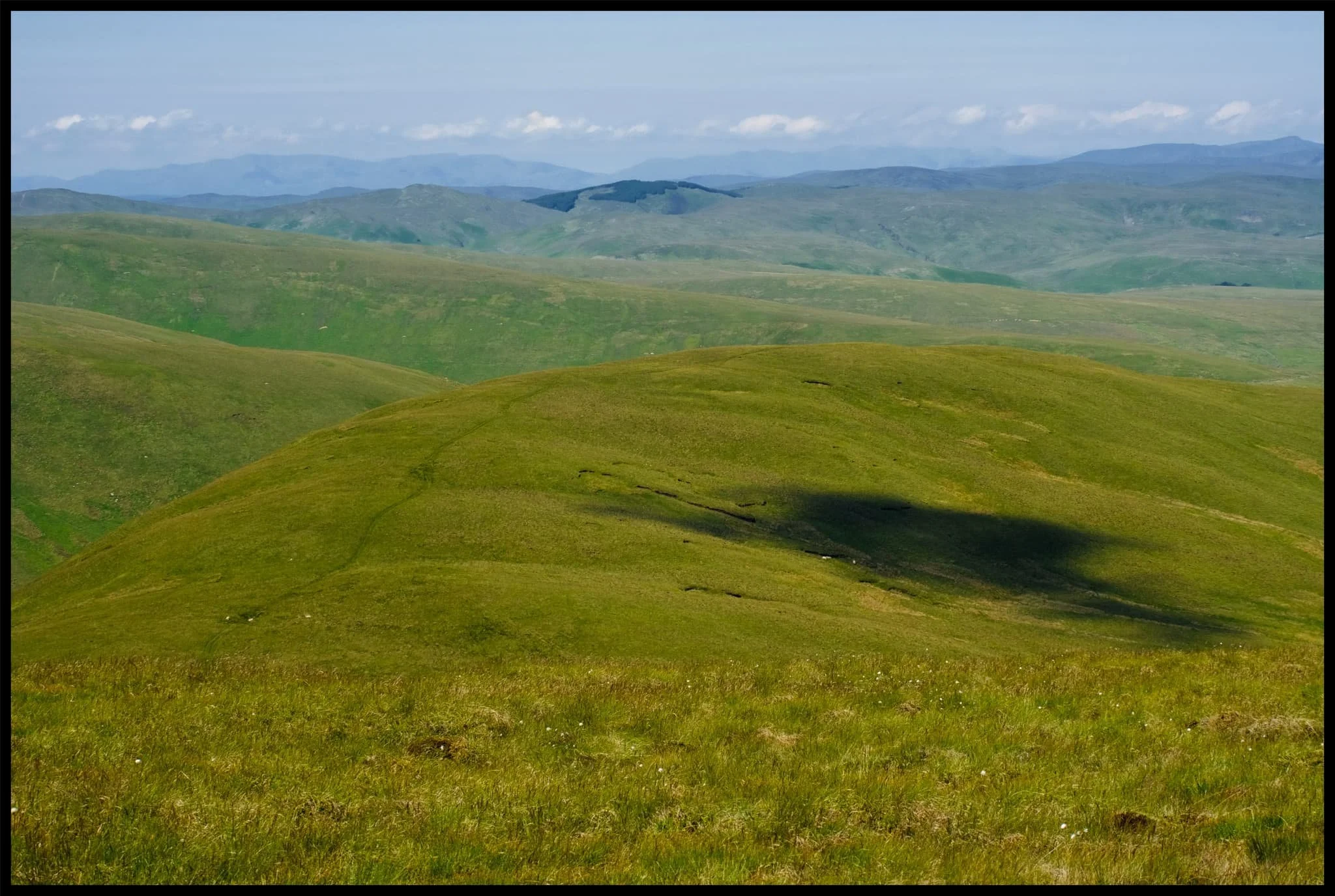  I instead elected for the Dales High Way, which take me up and over West Fell above Bowderdale. Here&rsquo;s the scene looking back at my progress. 