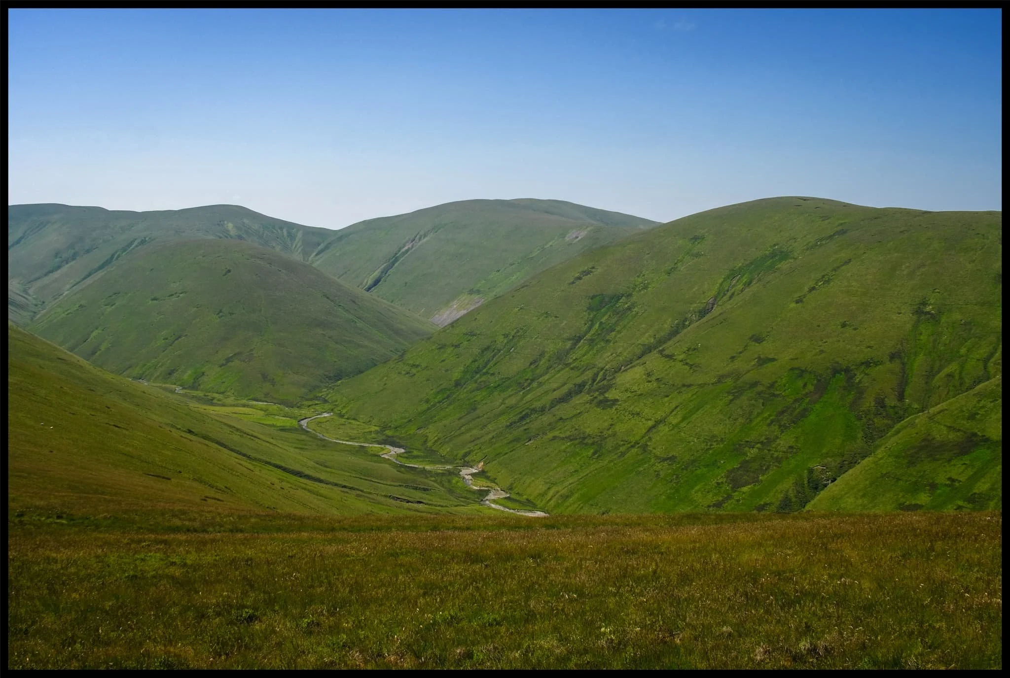  Another look west towards Langdale before I crest the summit of West Fell and examine the scene. 