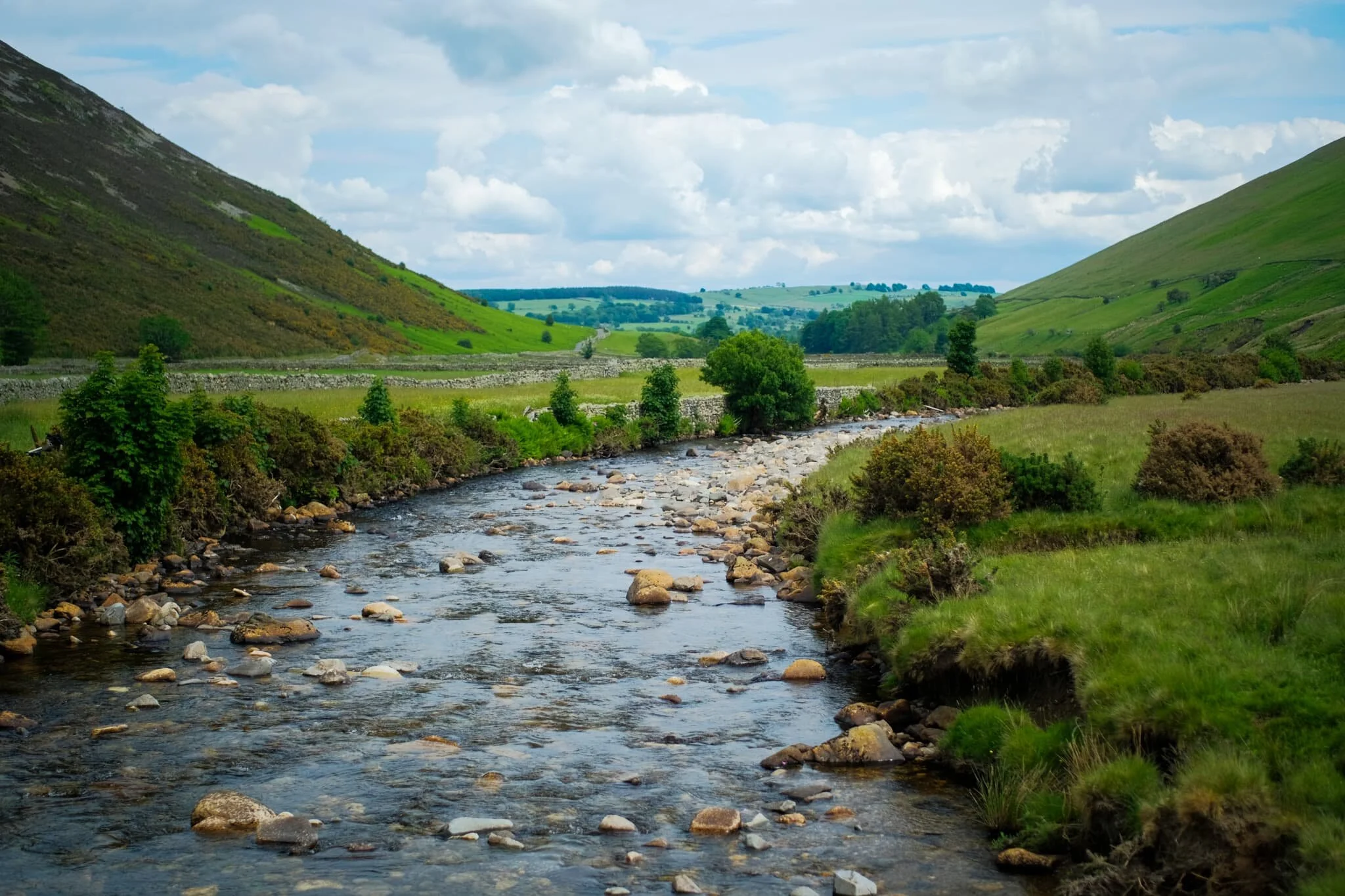  After following the clear, yet admittedly steep, path directly back down to the valley floor, we paused at the footbridge to admire this view all the way back up Mosedale. 