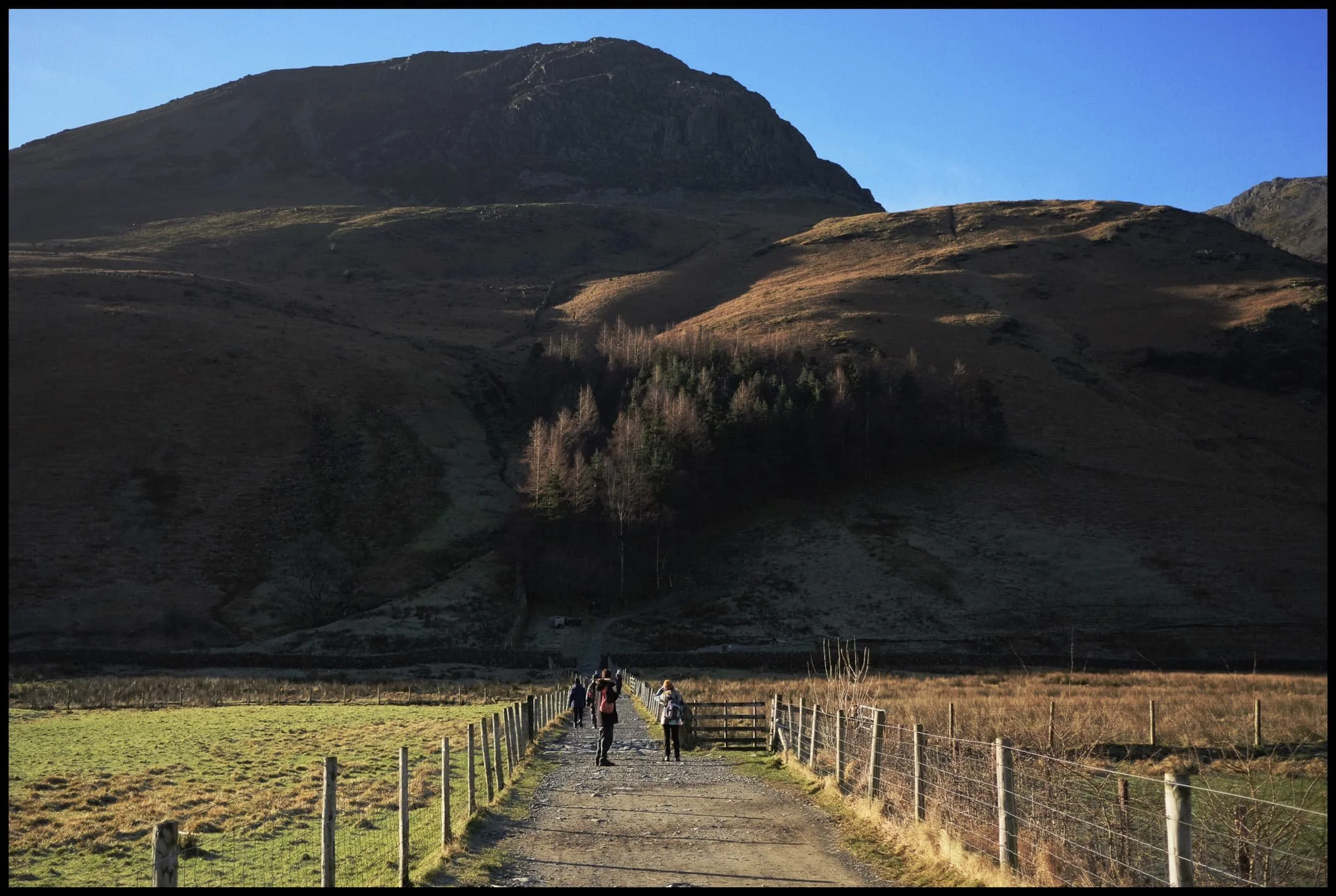  High Crag looming above the Buttermere trail. Though not busy, there were a fair few folk wandering around various parts of the trail with us. 