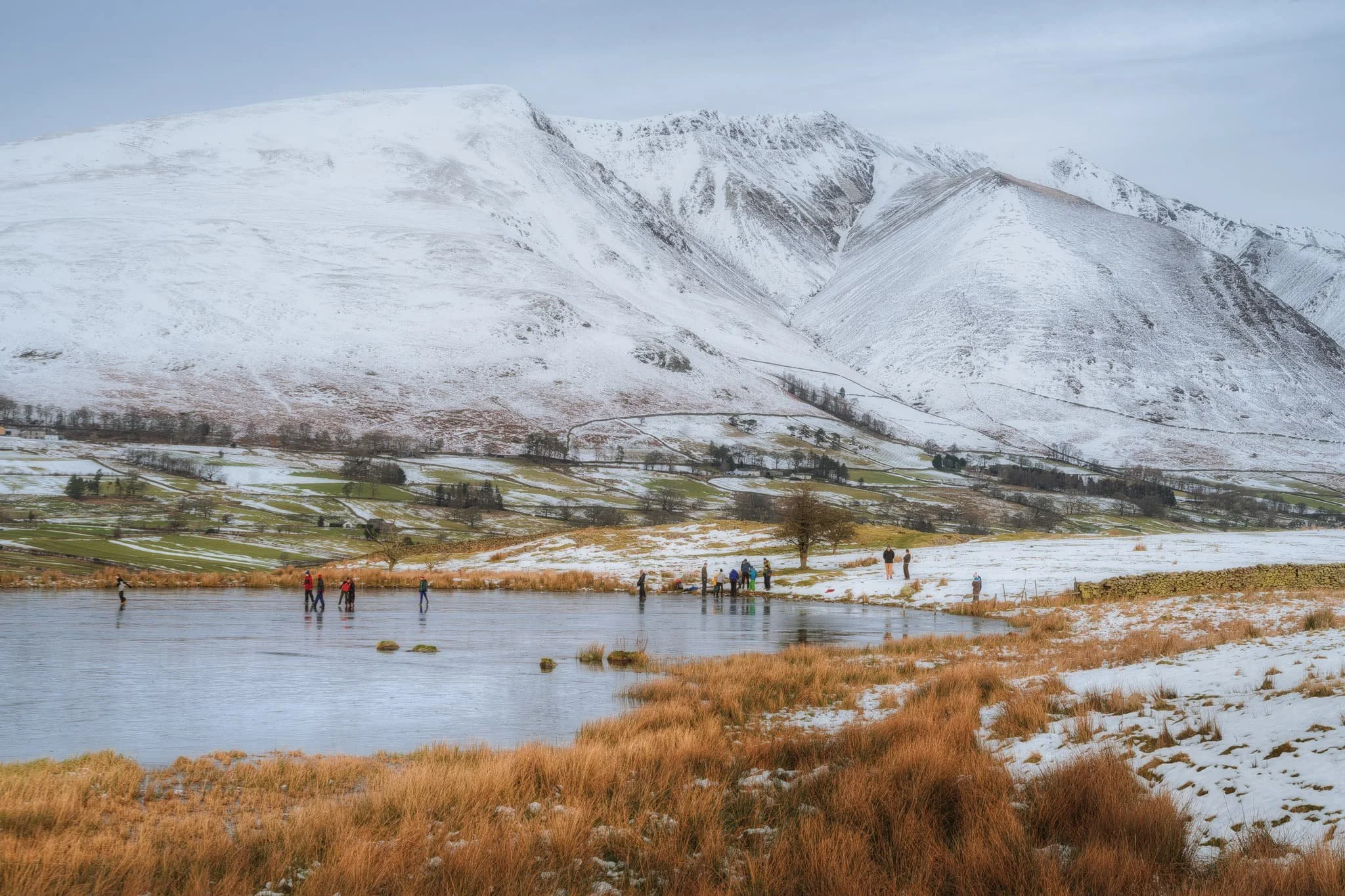  I&rsquo;ve lived in Cumbria for 12-ish years, and been in my fair share of Cumbrian snow, but this was the first time I&rsquo;d ever seen a tarn completely frozen. This is Tewet Tarn, with Blencathra looming behind. Families enjoyed skating on the tarn and generally mucking about. 