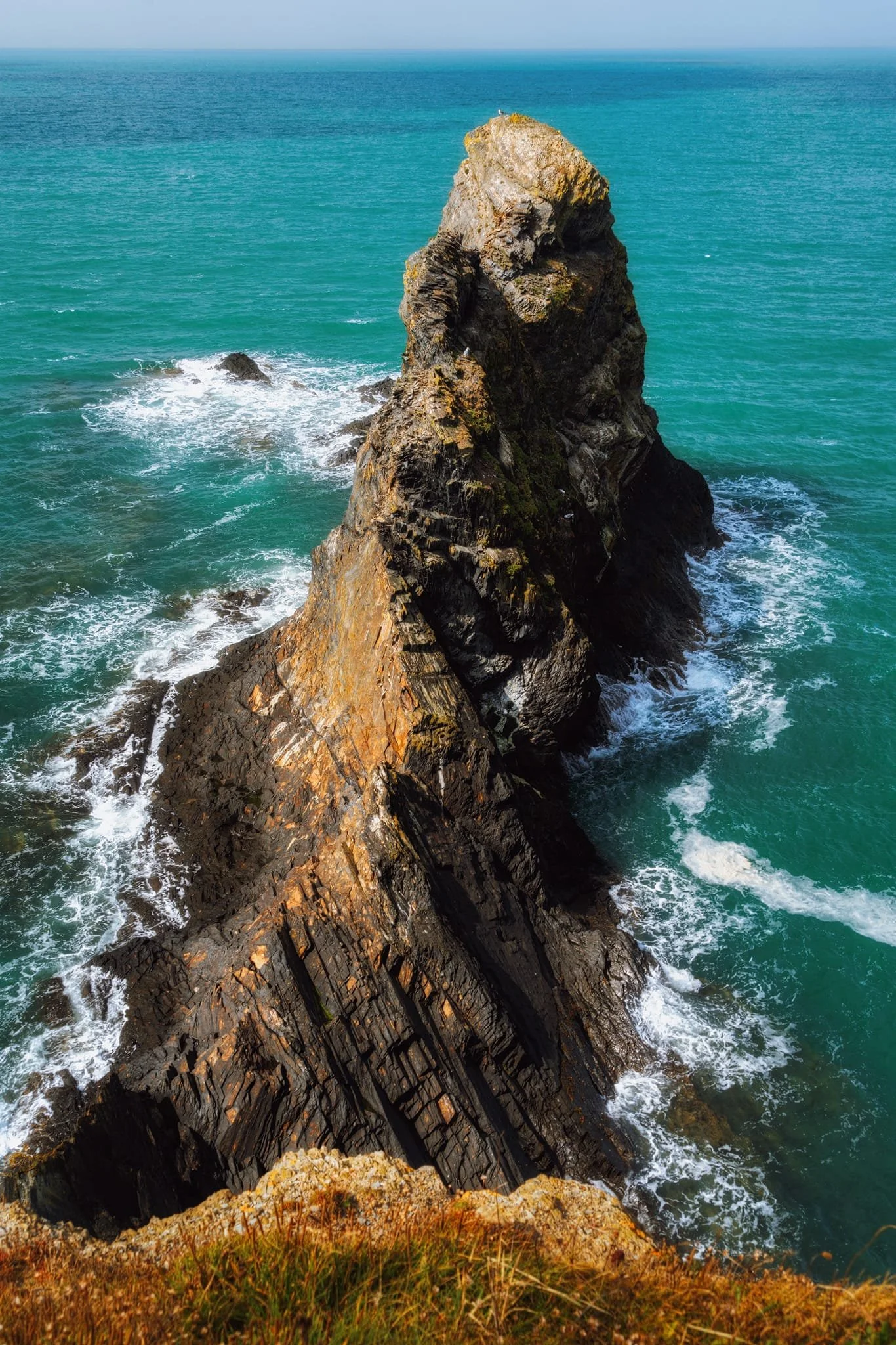  Looking down on the seemingly impossible-looking sea stack of  Careg Wylan , twisting and rising like a corkscrew above the sea. Just ridiculous. 
