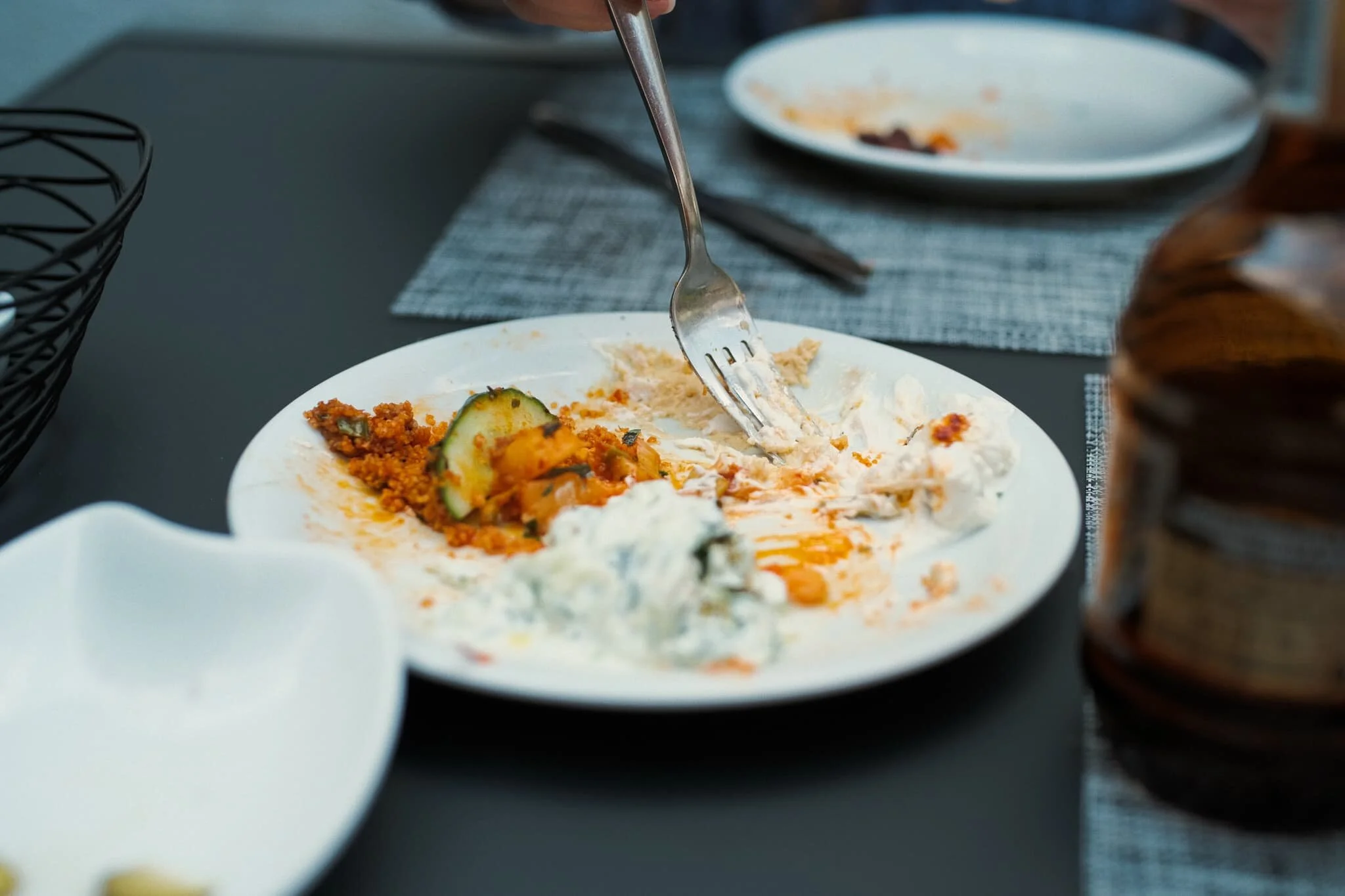  Part way through our starter, comprising of hummus,  cacık  (a bit like Greek  tzatziki ),  patlıcan ezme  (a Turkish aubergine salad),  Kısır  (spiced bulgar wheat salad),  Mücver  (deep fried courgette fritter), and  Patates Kavurma  (boiled potatoes with onion, parsley and chilli). 