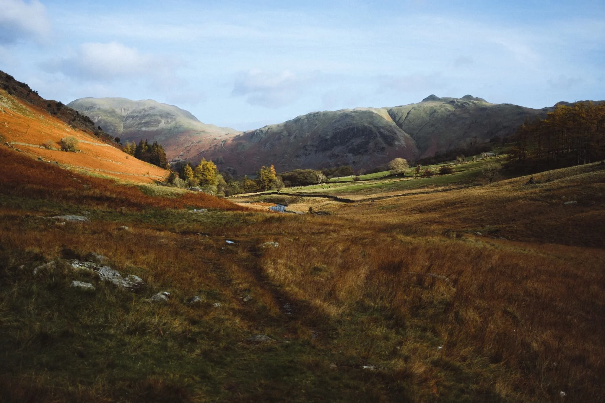  Behind us, the tops of Angletarn Pikes (567 m/1,860 ft) and Place Fell (657 m/2,156 ft) are treated to similarly gorgeous light. 