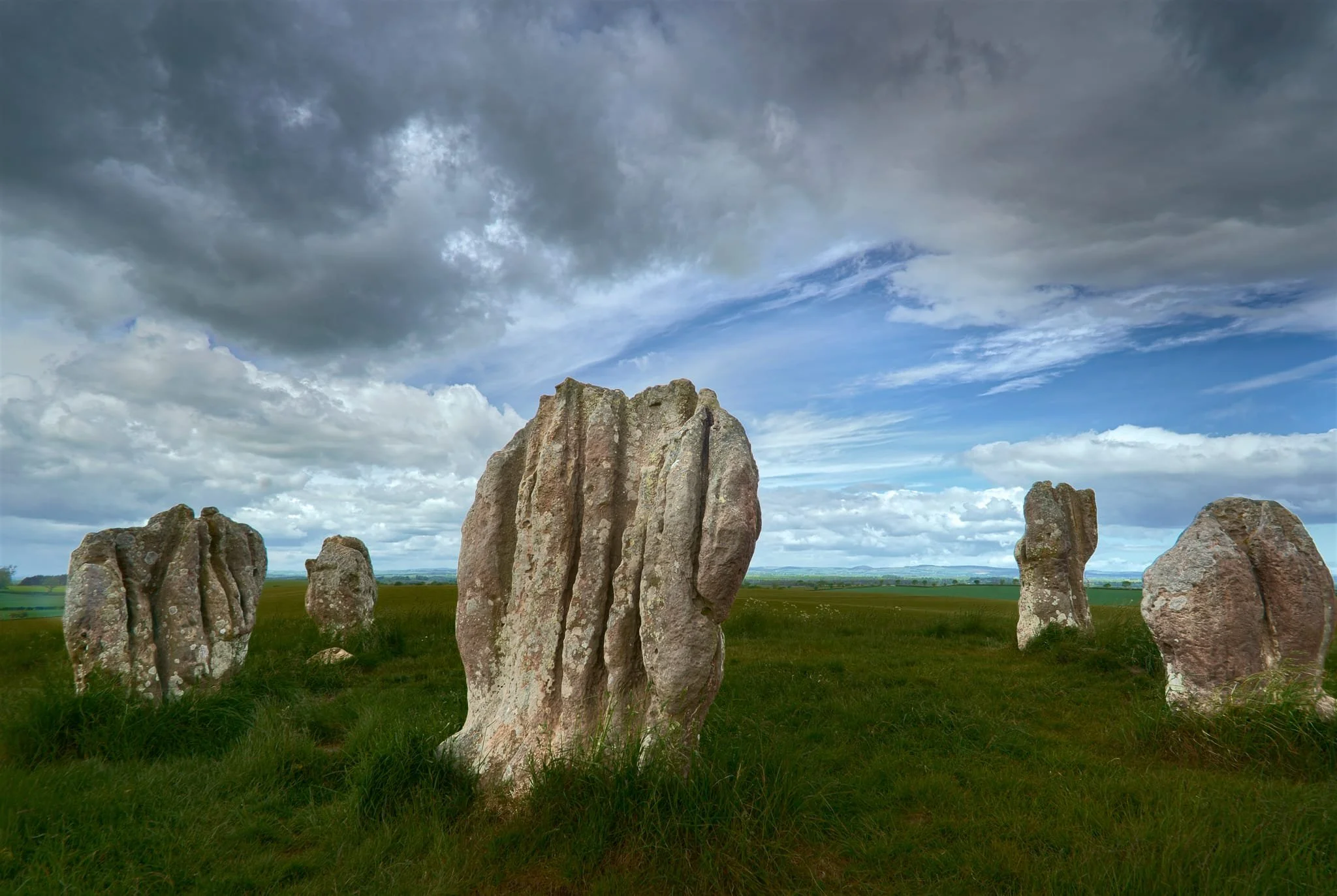  Here they are, the Duddo Five Stones, sitting eternally below a moving sky. From here there are 360° panoramic views across vast swathes of the Northumberland countryside. You can see why these stones were erected here. Unexpectedly, an older Californian couple soon joined us at the stone circle as we were shooting photos. They couldn&rsquo;t wrap their head around the age of these stones. 