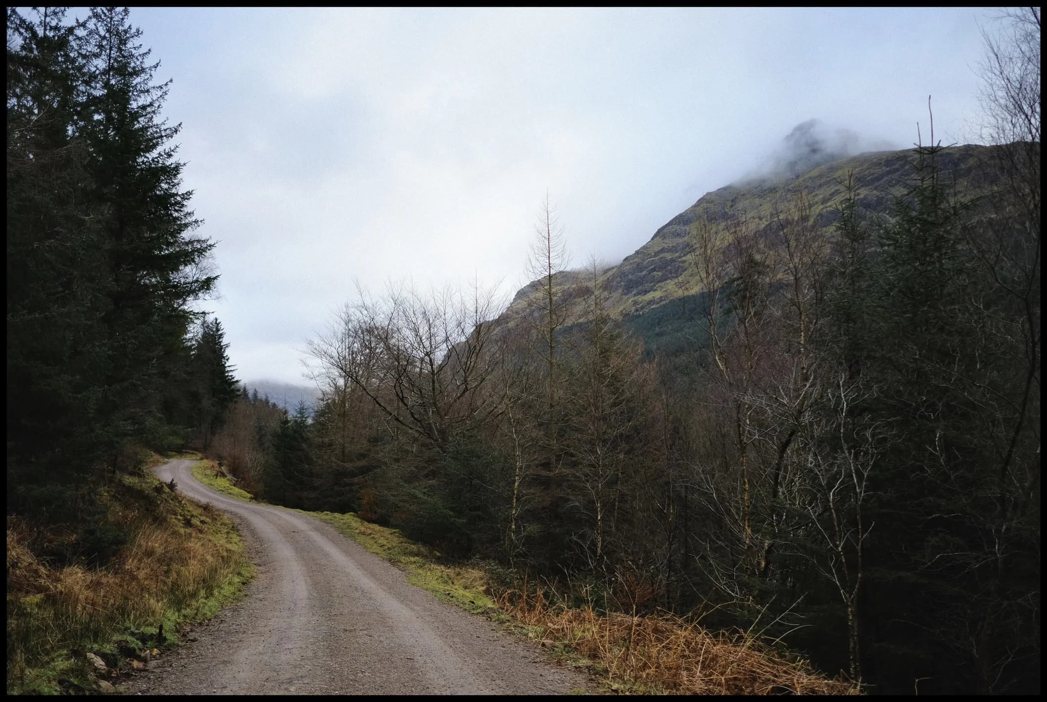  Swirling clouds wrestle with the summit of Pillar. 