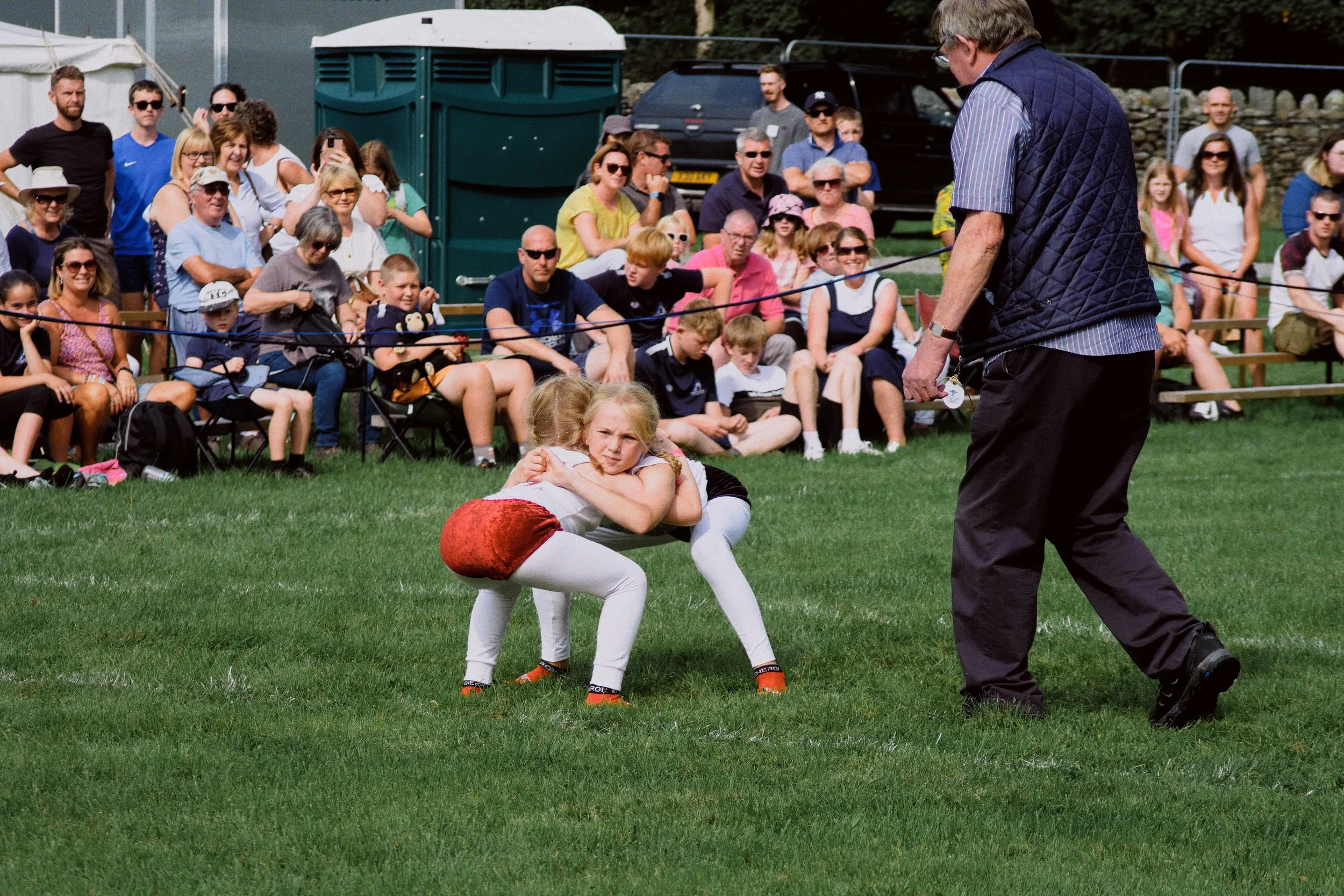  From the same wrestling club, now facing each other in the ring. 