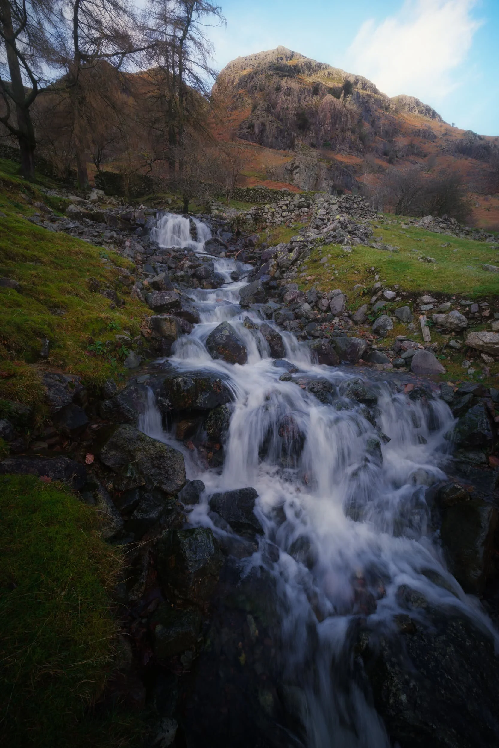  Here&rsquo;s something I  didn&rsquo;t  know about in Great Langdale! Near the Stickle Ghyll Barn Dad and I spotted a small stile that allowed one access over the fence towards these wonderful cascades. I whipped out my 9mm ultra-wide lens for some compositions of these cascades and Whitegill Crag above. 