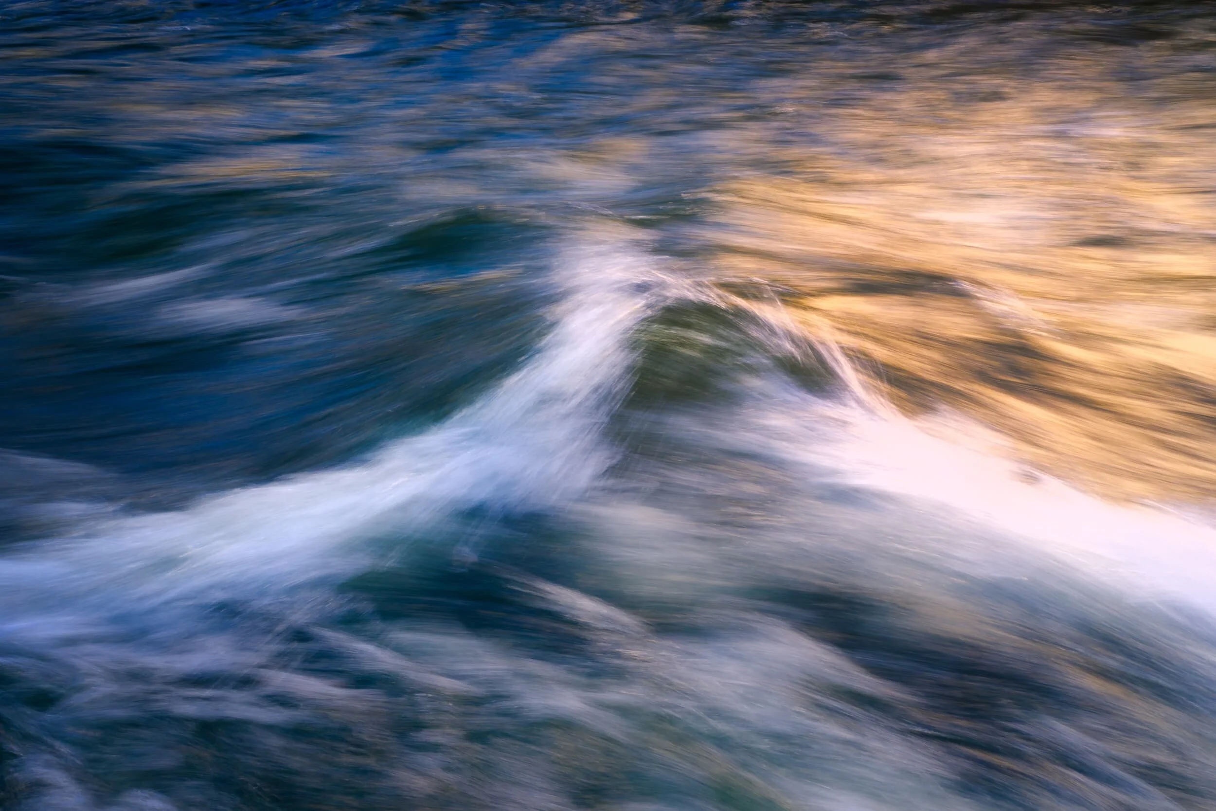  Nearer the Pikes the swollen beck was reflecting some wonderful light bouncing off the red fells above us. I closed the lens up to get this longer exposure of the flow of the river. 