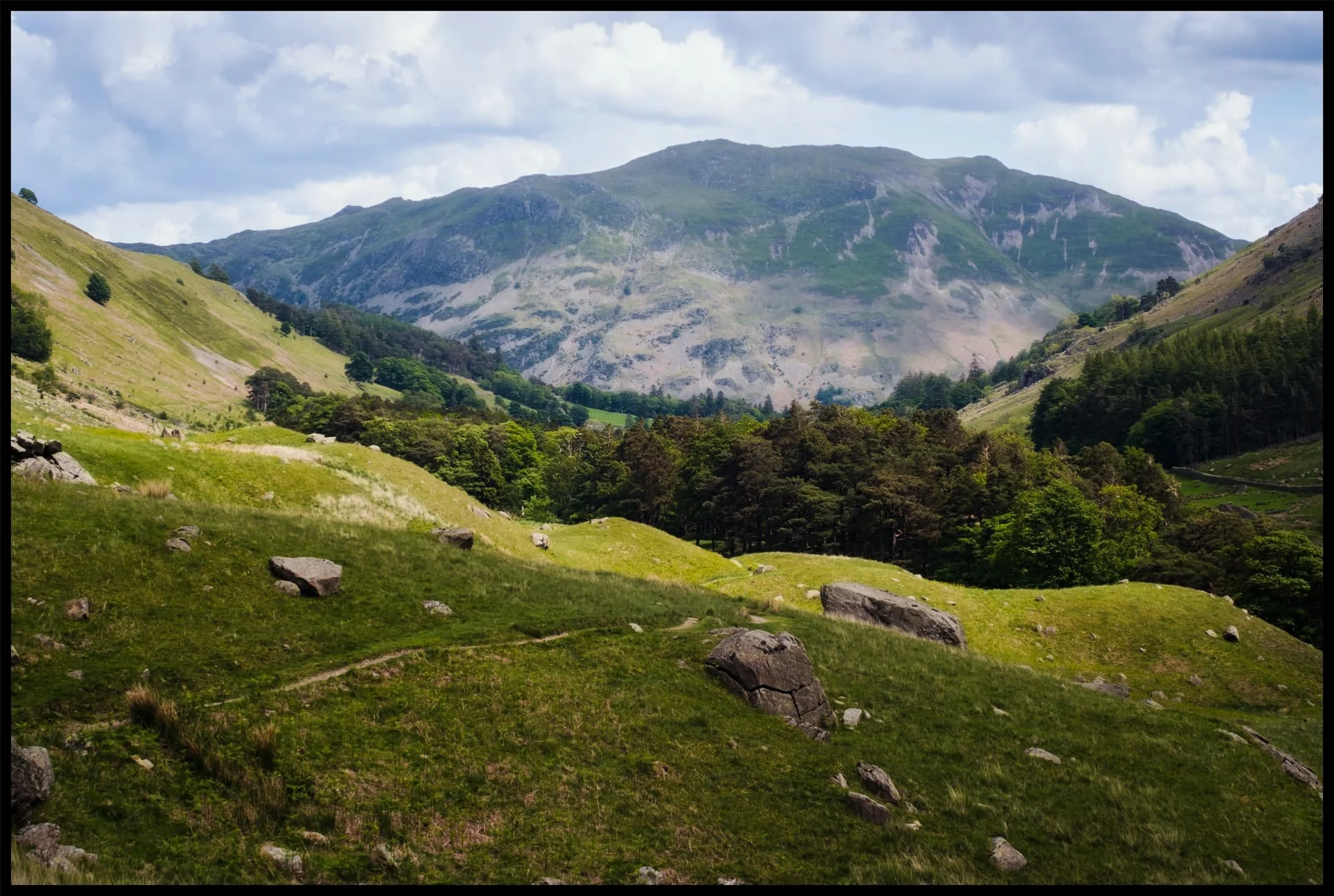  Place Fell&rsquo;s bulk rises above the rolling valley bottom of Grisedale. 