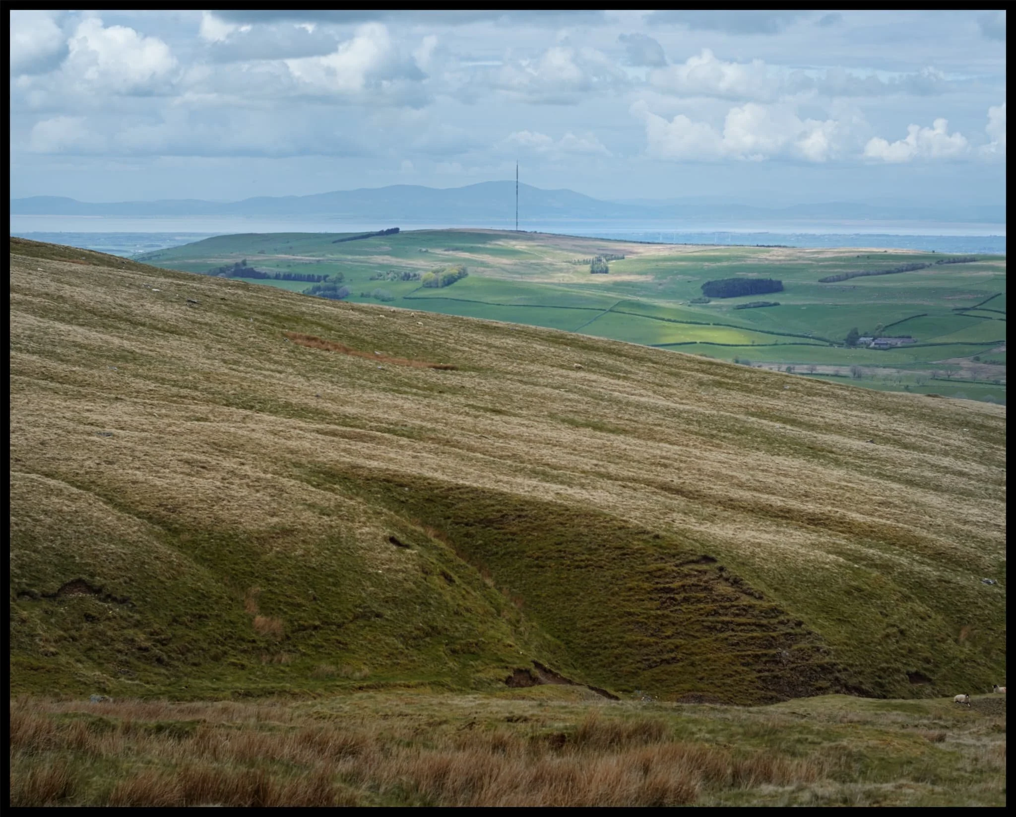  The view from near the top of Potts Gill and its ripples. Dead centre is a transmitting station and in the far distance are the coastal Galloway mountains across the Solway Firth. 