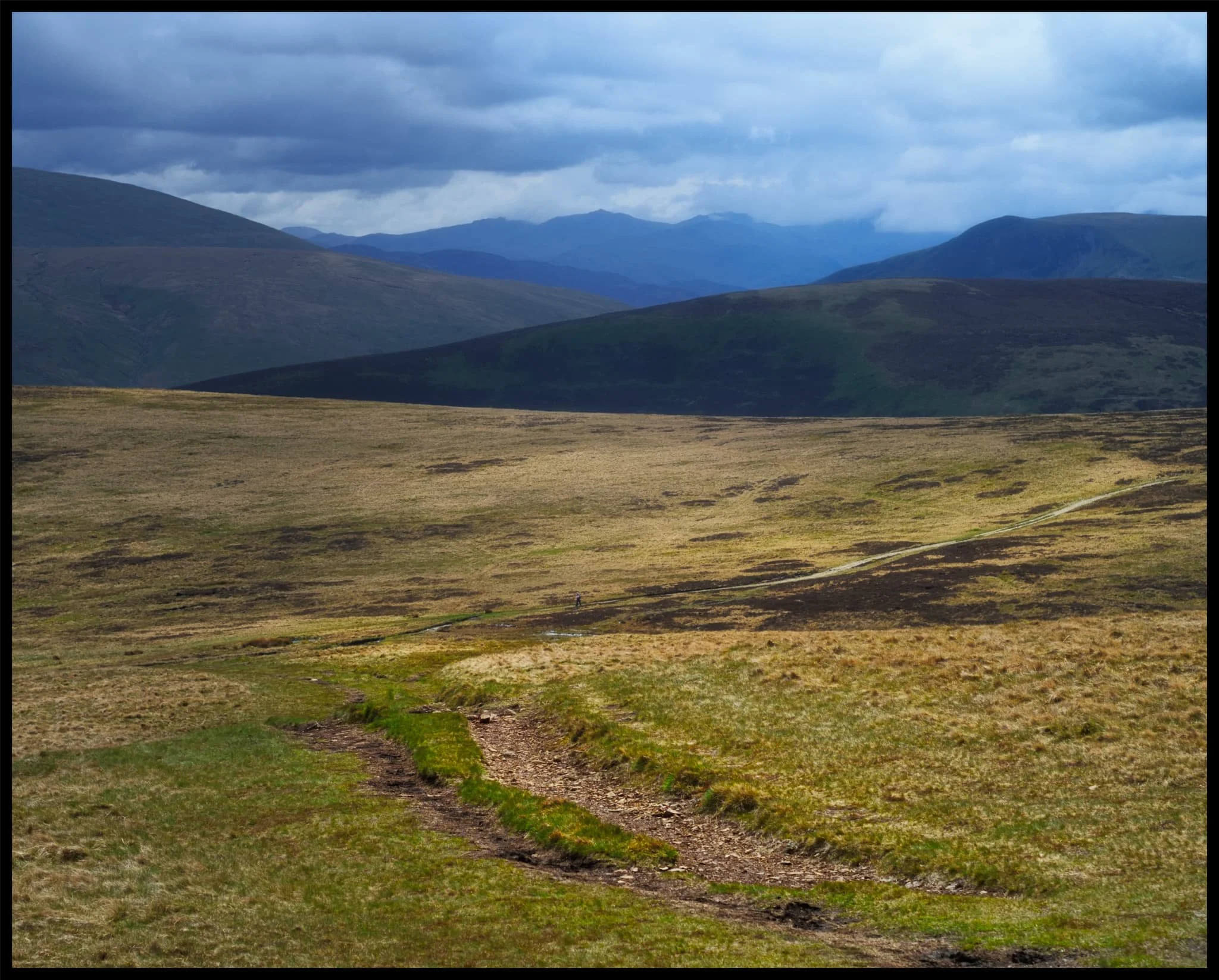  But finally, after lots of huffing and puffing, summit! Looking south from the summit of High Pike, the fells criss-cross each other towards the back of Blencathra. 