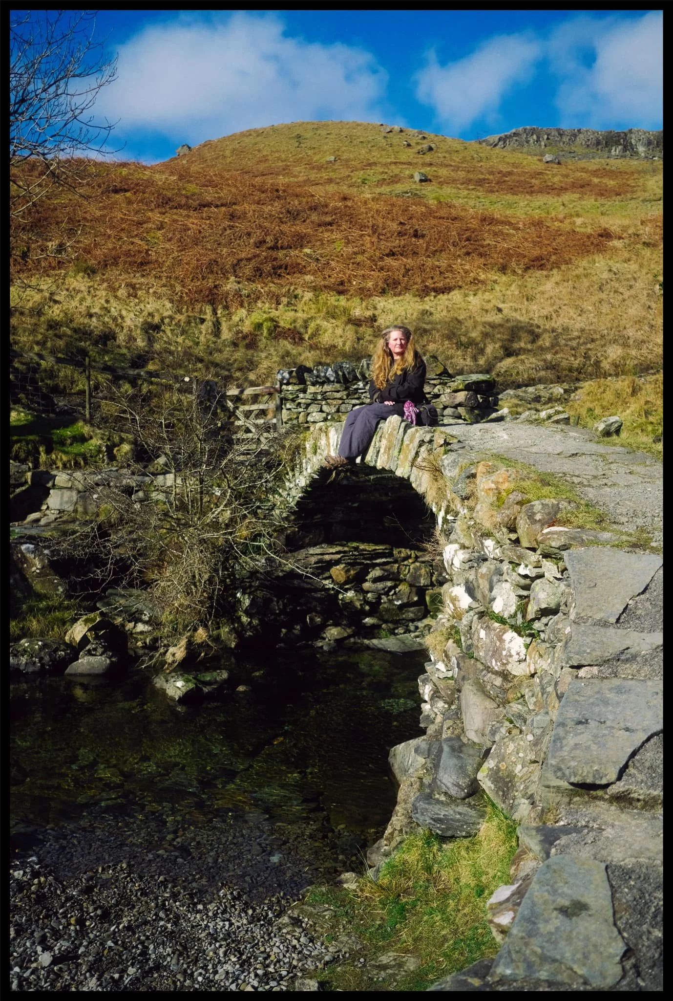  My lovely Lisabet, perched on the ancient packhorse bridge known as High Sweden Bridge. 
