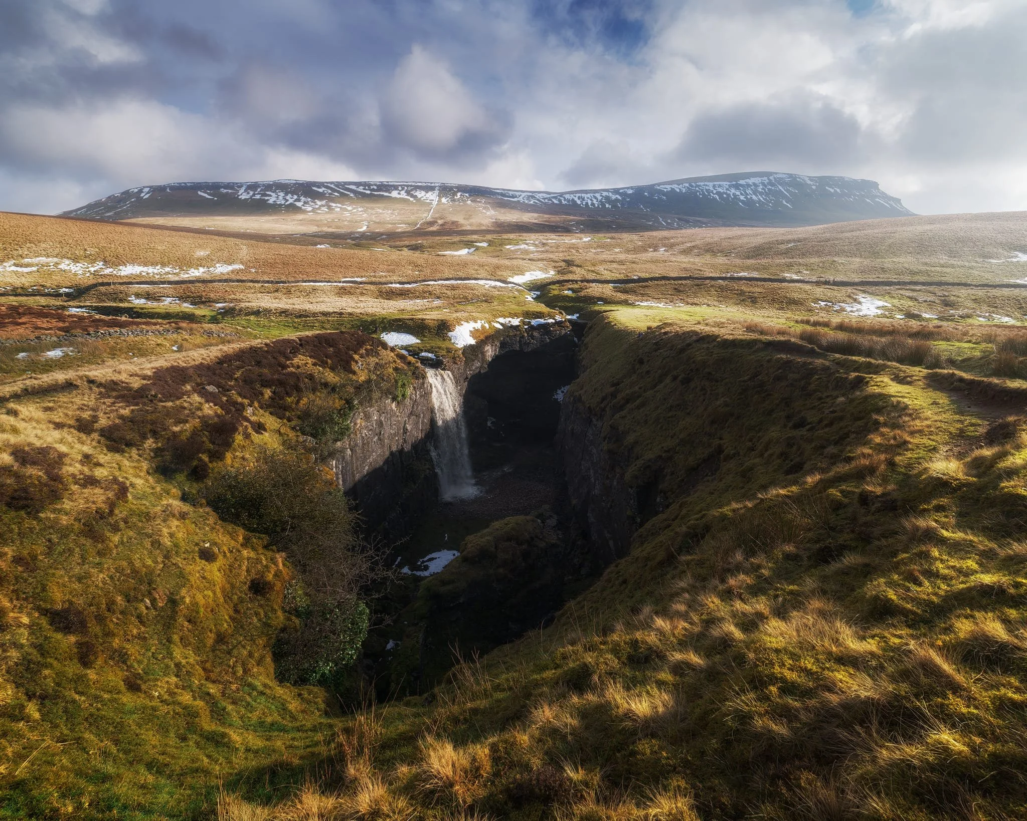  And there she is, finally ticked off my bucket list. England&rsquo;s largest natural hole, Hull Pot, with Hull Pot Beck tumbling down 60ft into the chasm. As mentioned before on this blog, Hull Pot is a large cave where the roof has collapsed, which has resulted in this massive chasm below Pen-y-Ghent. With my ultra-wide 14mm equipped, I was able to capture the entire scene. 