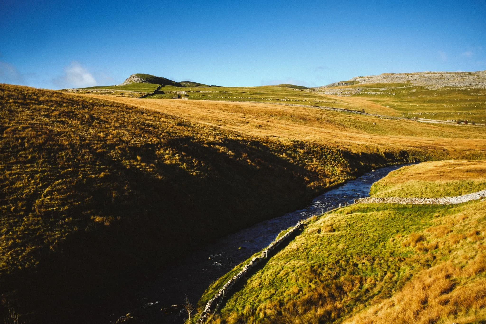  We&rsquo;ve now joined the Twistleton Bridleway above the River Twiss. The small hump of Tow Scar comes into view. 