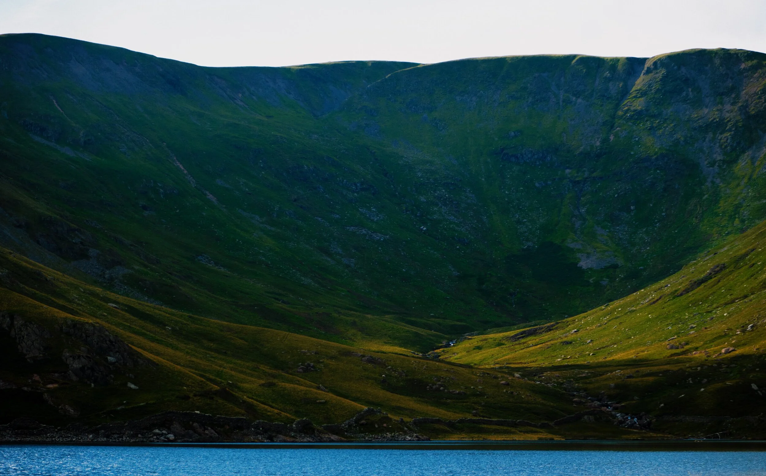  The wall at the head of Kentmere Reservoir known as Gavel Crag, the source of the River Kent. It is the Kent that gives its name to the reservoir and the valley (&ldquo;Kent Mere&rdquo;), as well as my hometown Kendal (&ldquo;Kent Dale&rdquo;). It is said that the River Kent is one of the fastest flowing rivers in England. 