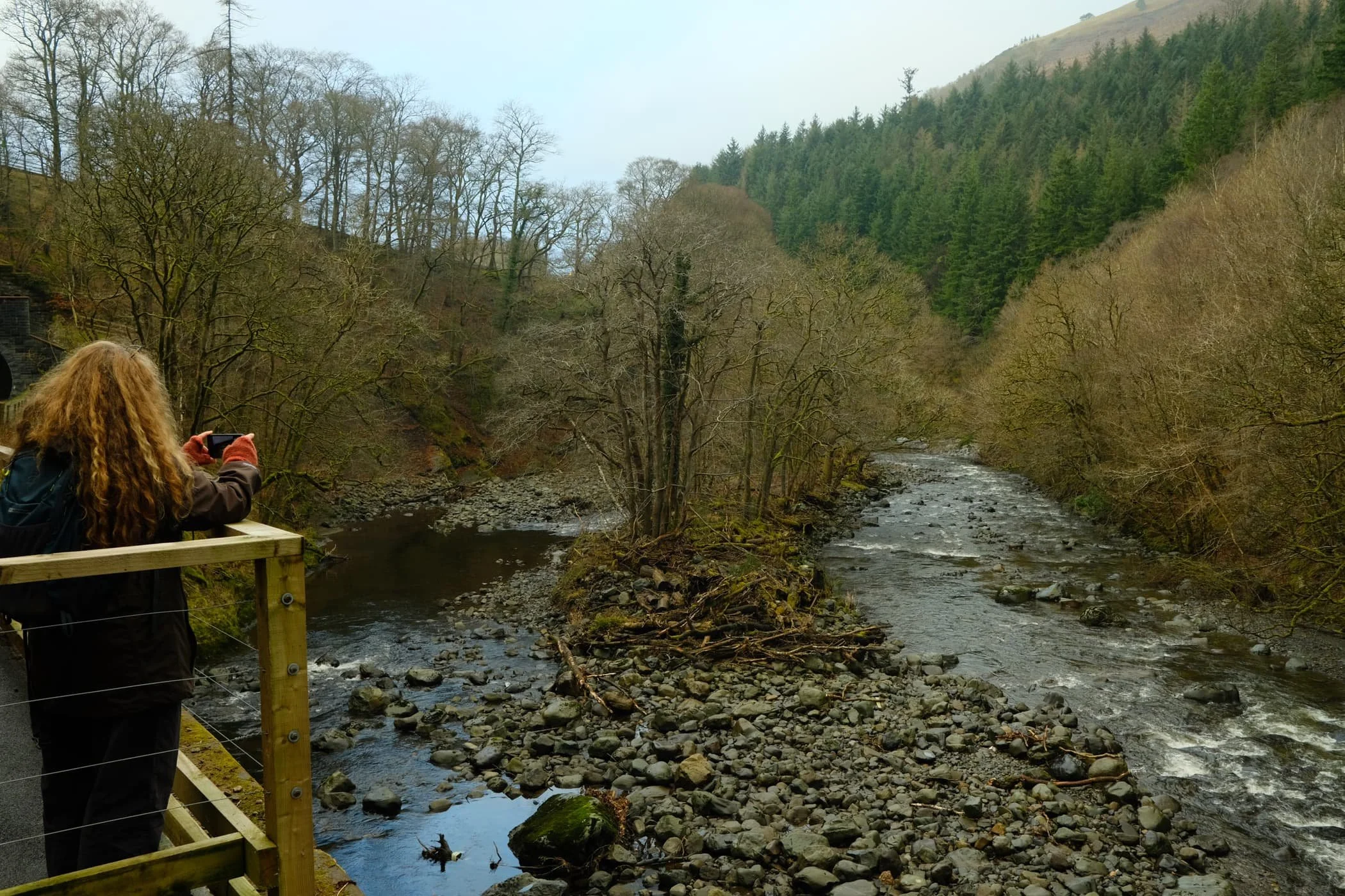  On the other side of the tunnel, panoramic views of the River Greta and Latrigg open up. 
