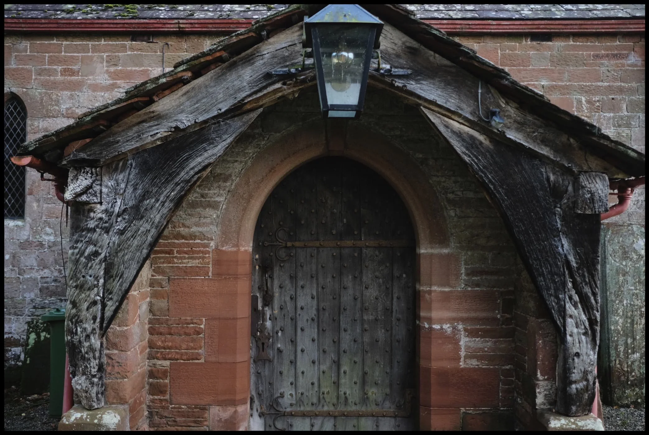  The main entrance to the church. Historic England specifies this timber frame thus: &ldquo;North timber-framed gabled porch of c1523&rdquo;. So 500-years old. 