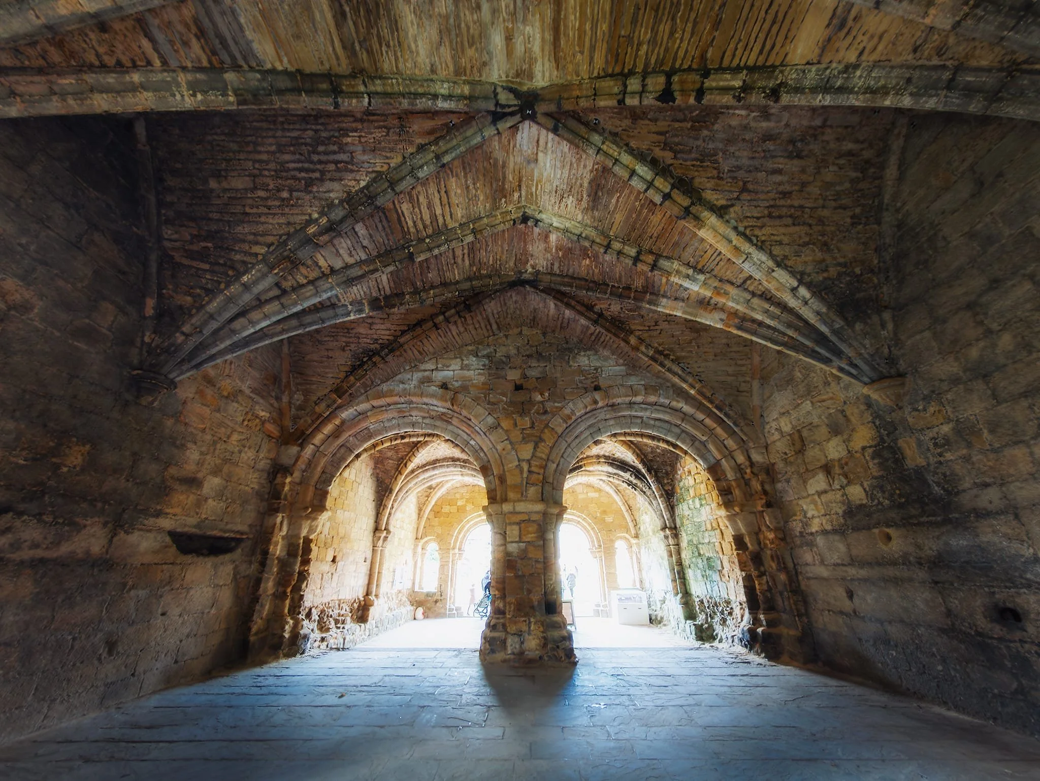  Looking back from the windows of the Chapter House towards its entrance revealed this beautiful symmetry and lovely framing created by the ribbed ceiling. 