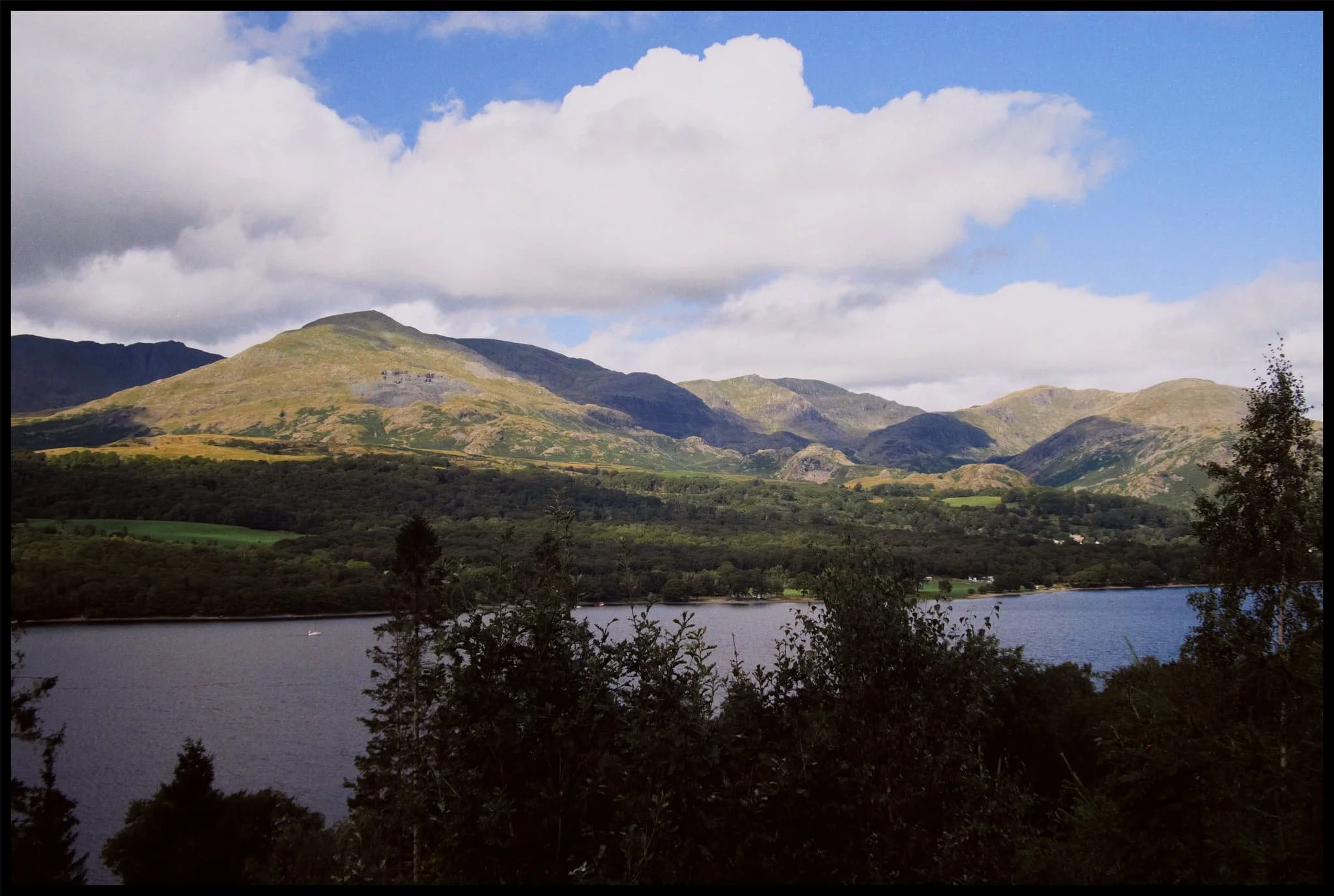  Upon locating the forestry track we climbed higher and higher towards Lawson Park. The views over Coniston Water towards the Coniston Fells, and the Old Man of Coniston (802 m / 2,632 ft) in particular, get better and better. 