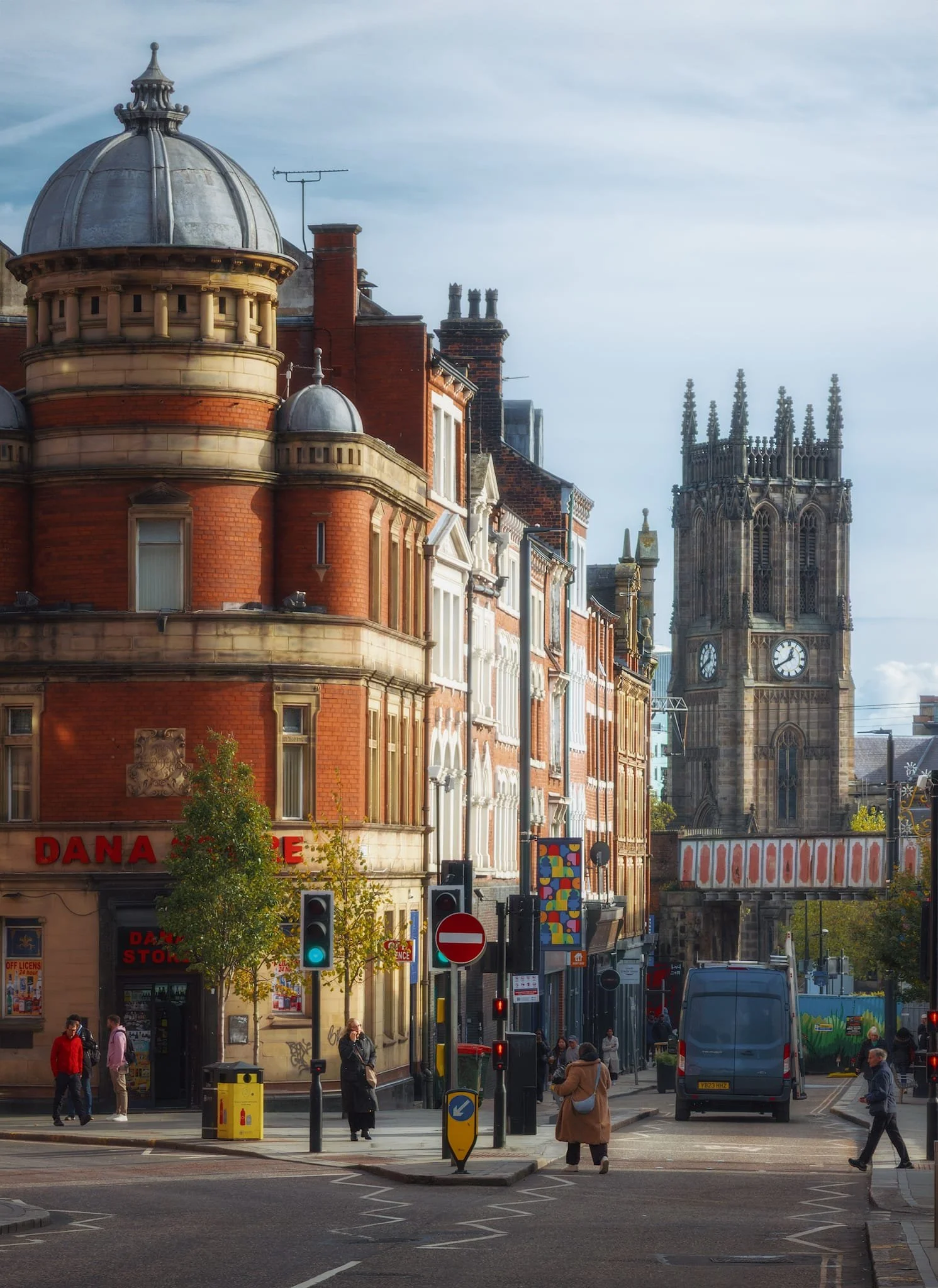  After a bite to eat at  Jenny&rsquo;s Jerk Chicken  in the famous Kirkgate Food Hall, we continued our meanderings. On the left, No. 4 New York Street, originally a bank. In the distance, Leeds Minster rises imperiously.  
