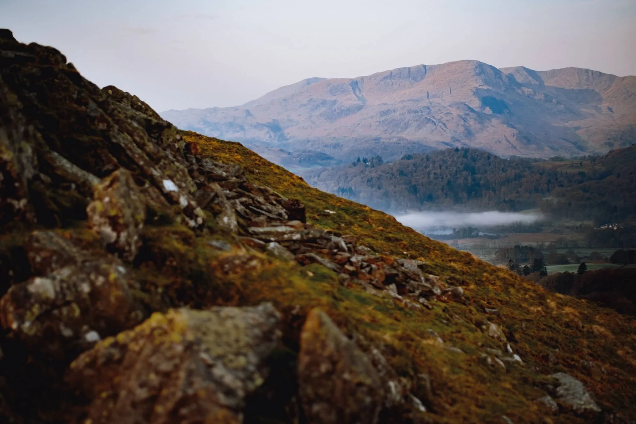  Beautiful Wetherlam (763 m/2,502 ft) finally receiving some of the sunrise light, as the mist in the valleys starts to burn off. 