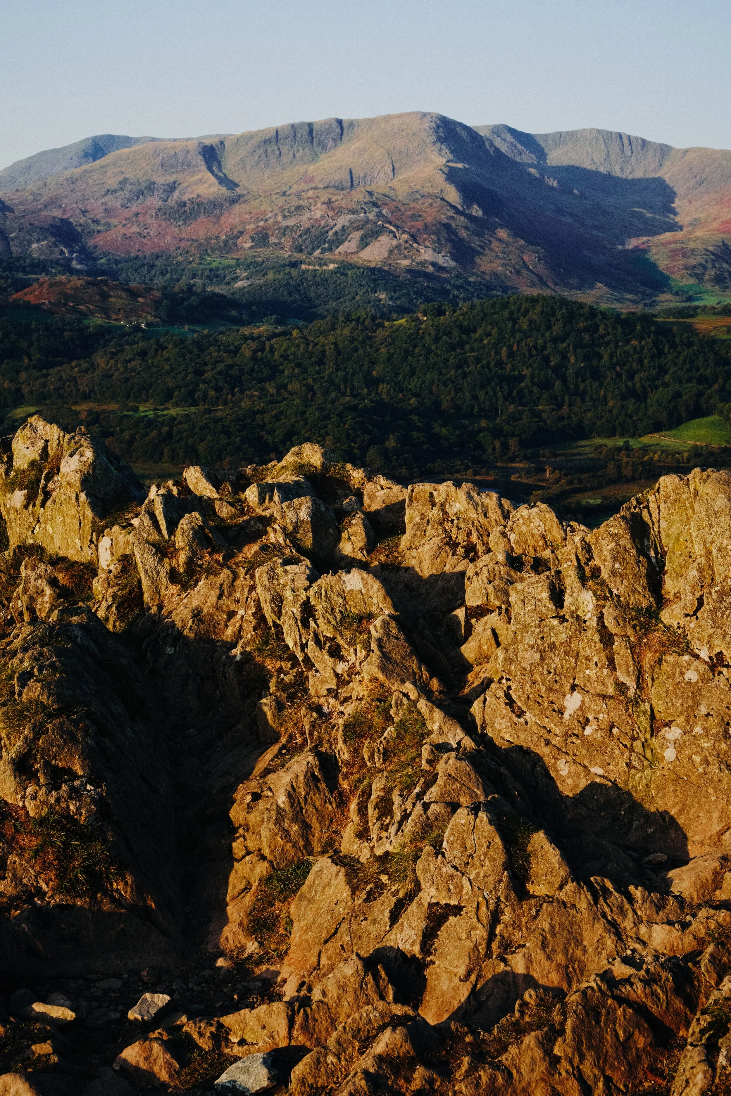  From the summit you can enjoy a clear view of Wetherlam (763 m/2,502 ft), which I shot from the summit&rsquo;s crags. 