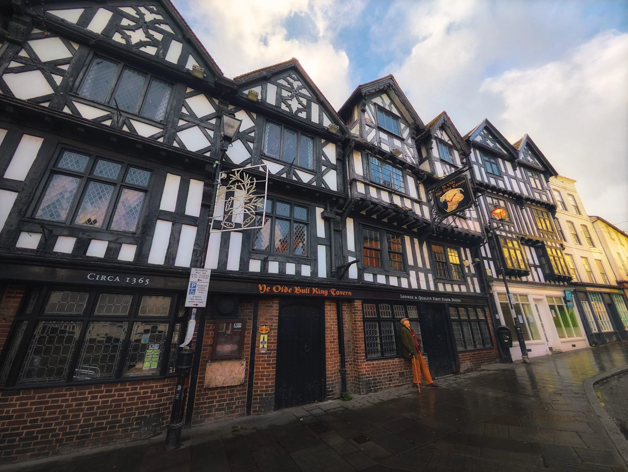  Another one of Ludlow&rsquo;s famous historical buildings,  Ye Olde Bull Ring Tavern , apparently dating back to 1365 CE. What we see now is a 1600s timber-framed building with two sections. It shows leaded lattice windows, and 1700s sashes and jettied dormers. It still features the original exposed framing, decorative beams, and moulded plasterwork throughout. Incredible. According to  its website , the interior was renovated in 2012 and still in business as of 2025. However, by the time of our arrival in October 2025, the business appears to be no more. 