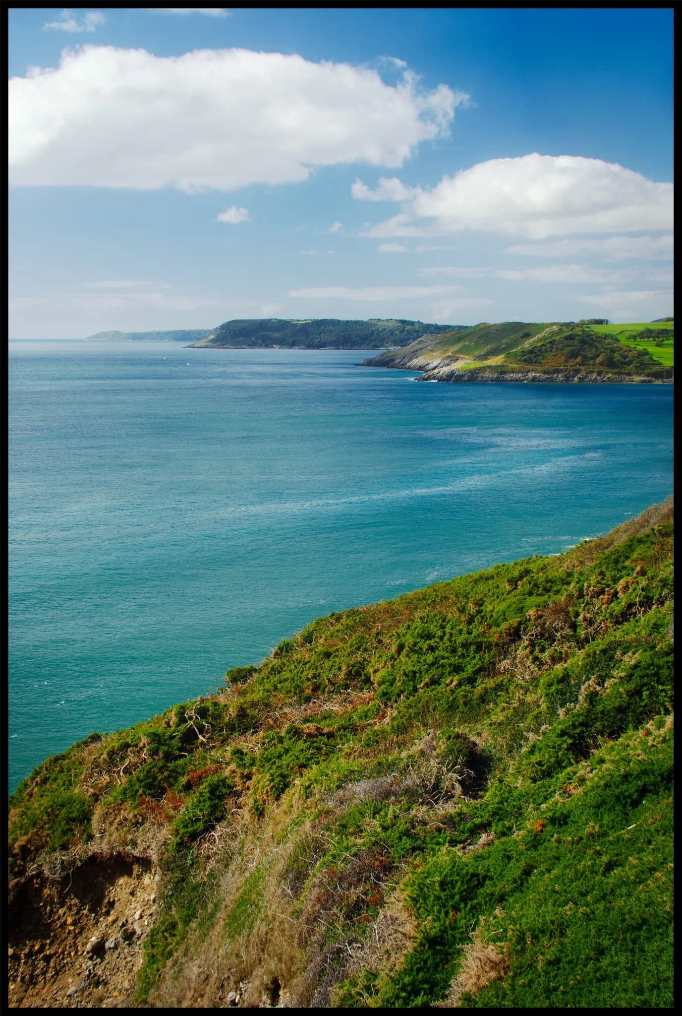  Beyond Bracelet Bay we followed the Wales Coast Path west towards Langland Bay. It was turning out to be a corker of a day, the sea glowing a deep aquamarine. 