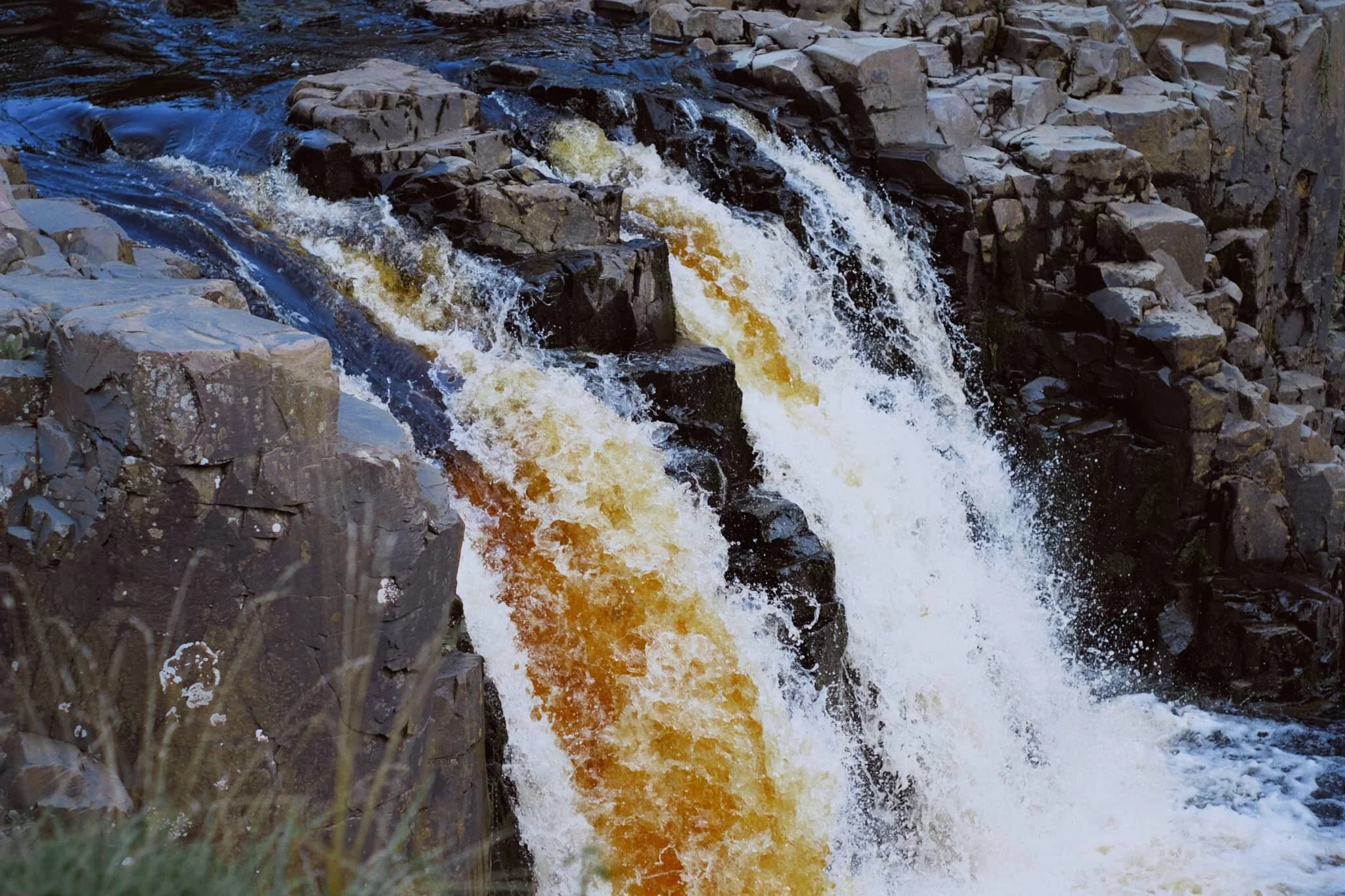  A tighter composition of the main falls of Low Force, trying to convey the sheer power of these waterfalls. The redness in the water comes from all the peat the river carries from the high moorlands of the North Pennines. 