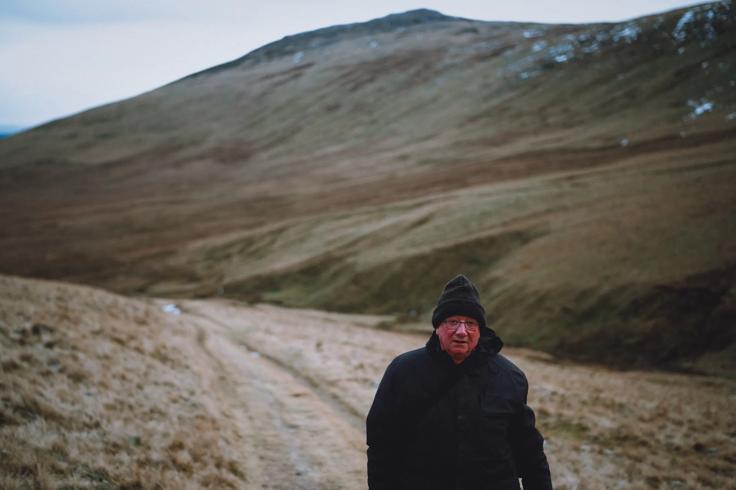  Managed to snap this candid shot of Dad, with Carrock Fell (661 m/2,169 ft) behind. I think Dad&rsquo;s face is testament to the sub-zero temperatures blowing right into our faces. 