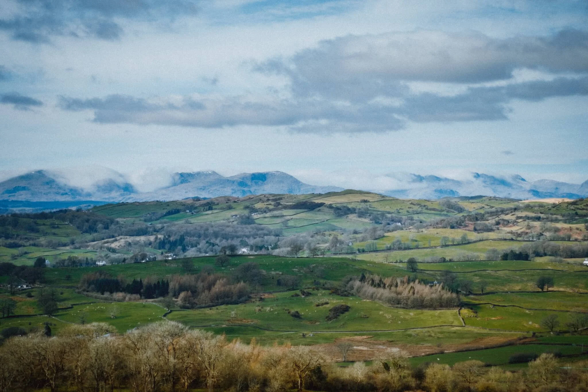  Check  that  out. Not only was the atmosphere clear enough to get a good glimpse of the Lake District fells, but the remnants of a temperature inversion had caused these &ldquo;waterfalls&rdquo; of clouds to spill over and around the fells. Absolutely incredible scenes. 