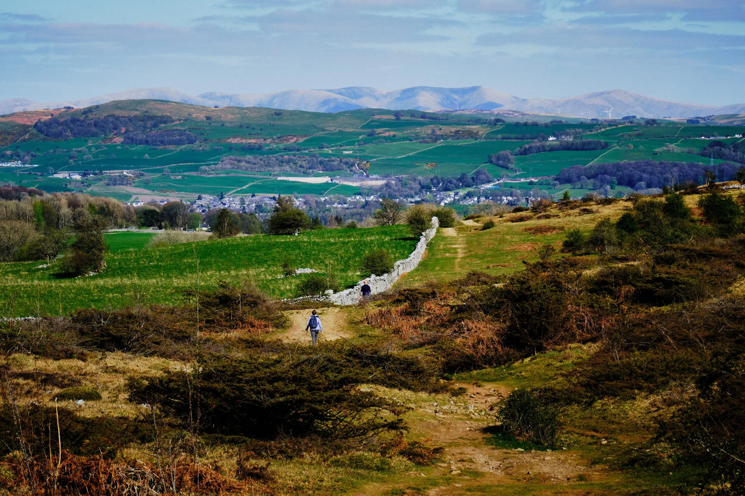  Looking back down the route we were taking to Scout Scar. In the distance lies Kendal, with Benson Knott to the left, and even further in the distance you can make out the gentle rolling hills of the Howgills. 