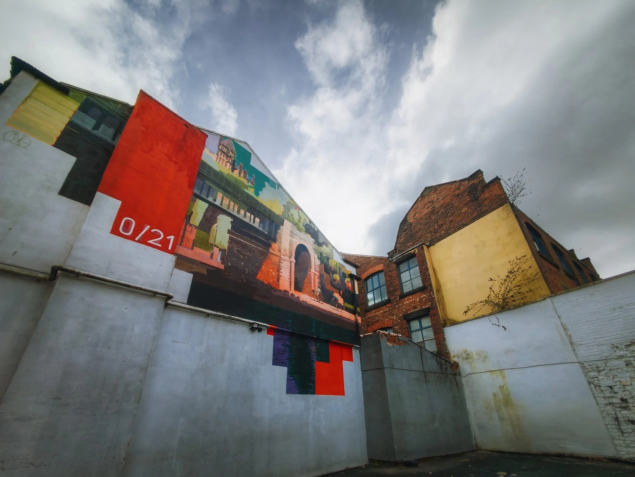  The next mural, found behind the  Slug & Lettuce . The piece is called  Mile 0/21  by  Gavin Renshaw . It depicts the official start and end of the Guild Wheel walk, created in 2012 as part of the Preston Guild celebration.  