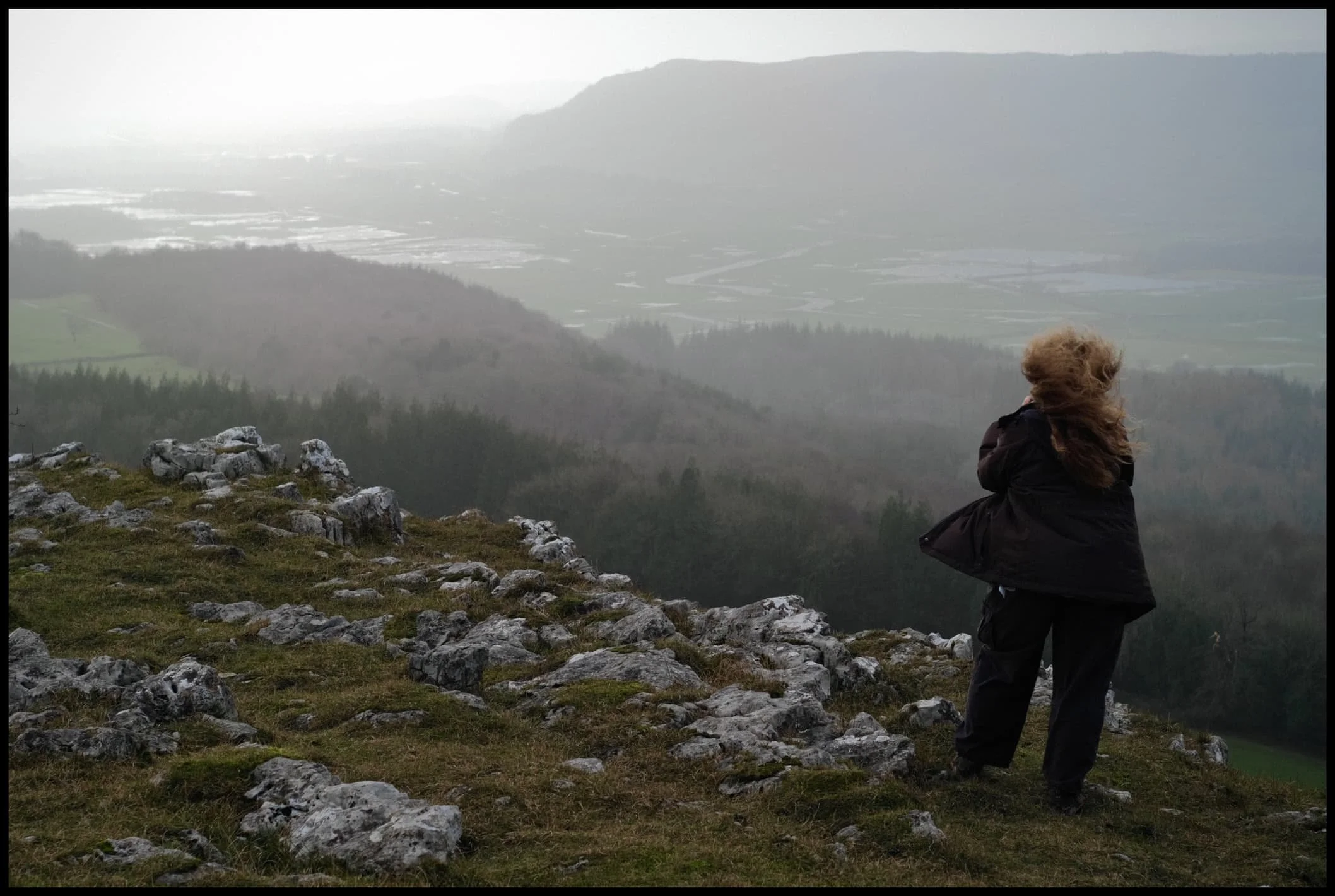  My lovely Lisabet, fighting the storm near the cliff edge at Hodgson&rsquo;s Leap to nab some crackin&rsquo; light. 