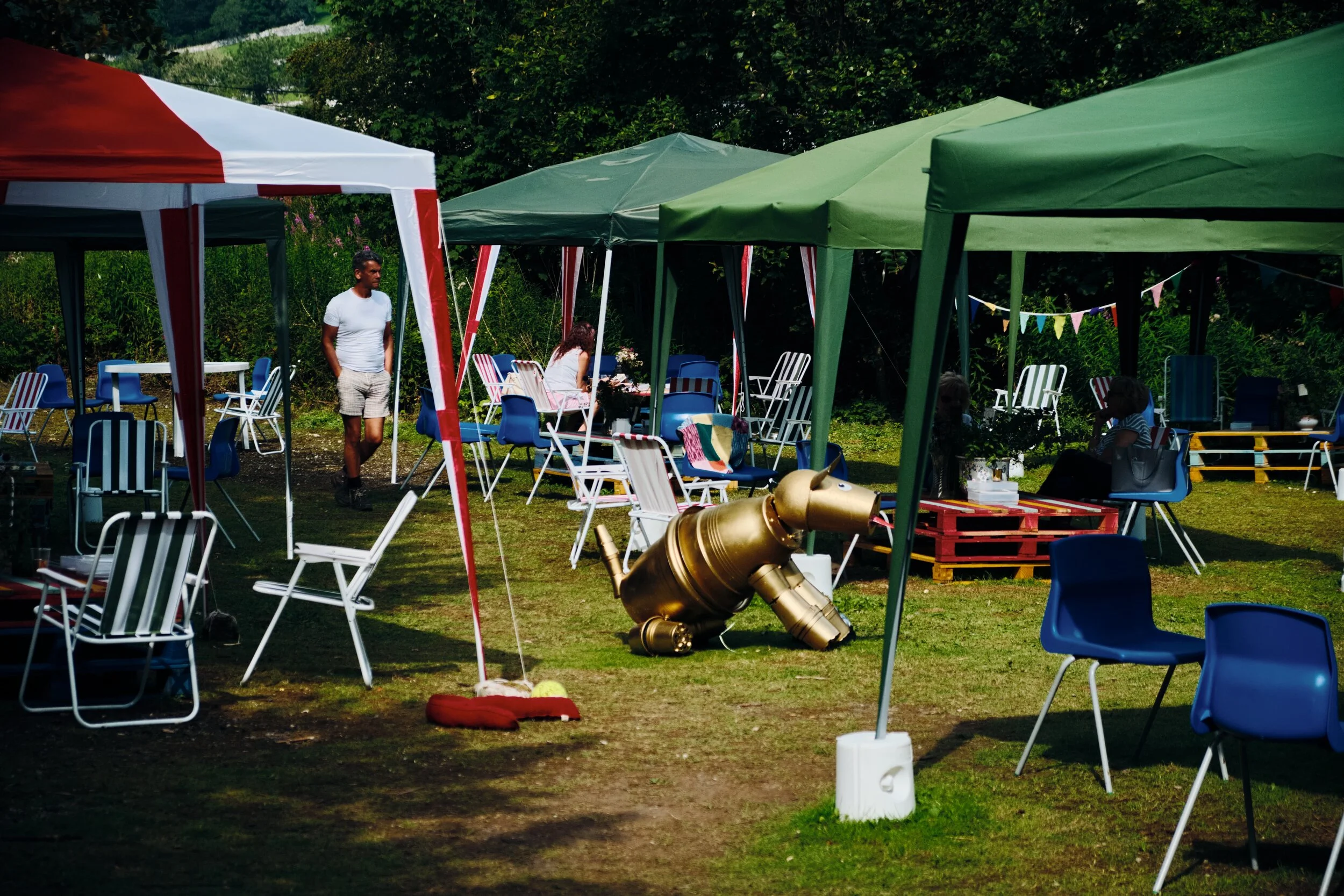  Back at Settle, we stop for refreshments at Victoria Hall, in order to support its donation efforts to stay afloat during troubling times. Yes, that&rsquo;s a golden dog made from flowerpots. 
