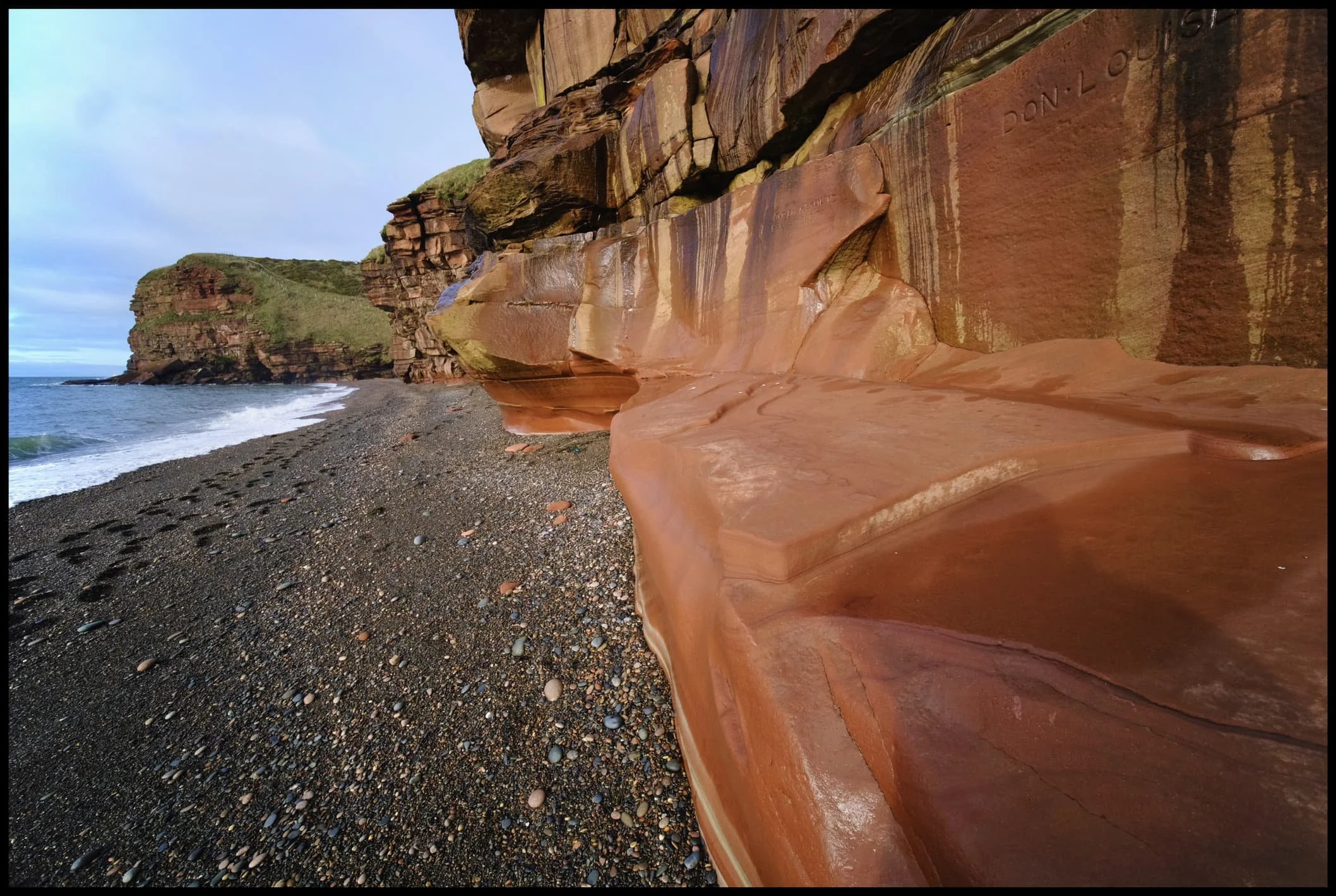  Most of the sandstone cliffs are wet and constantly dripping water from the grass and soil above. 