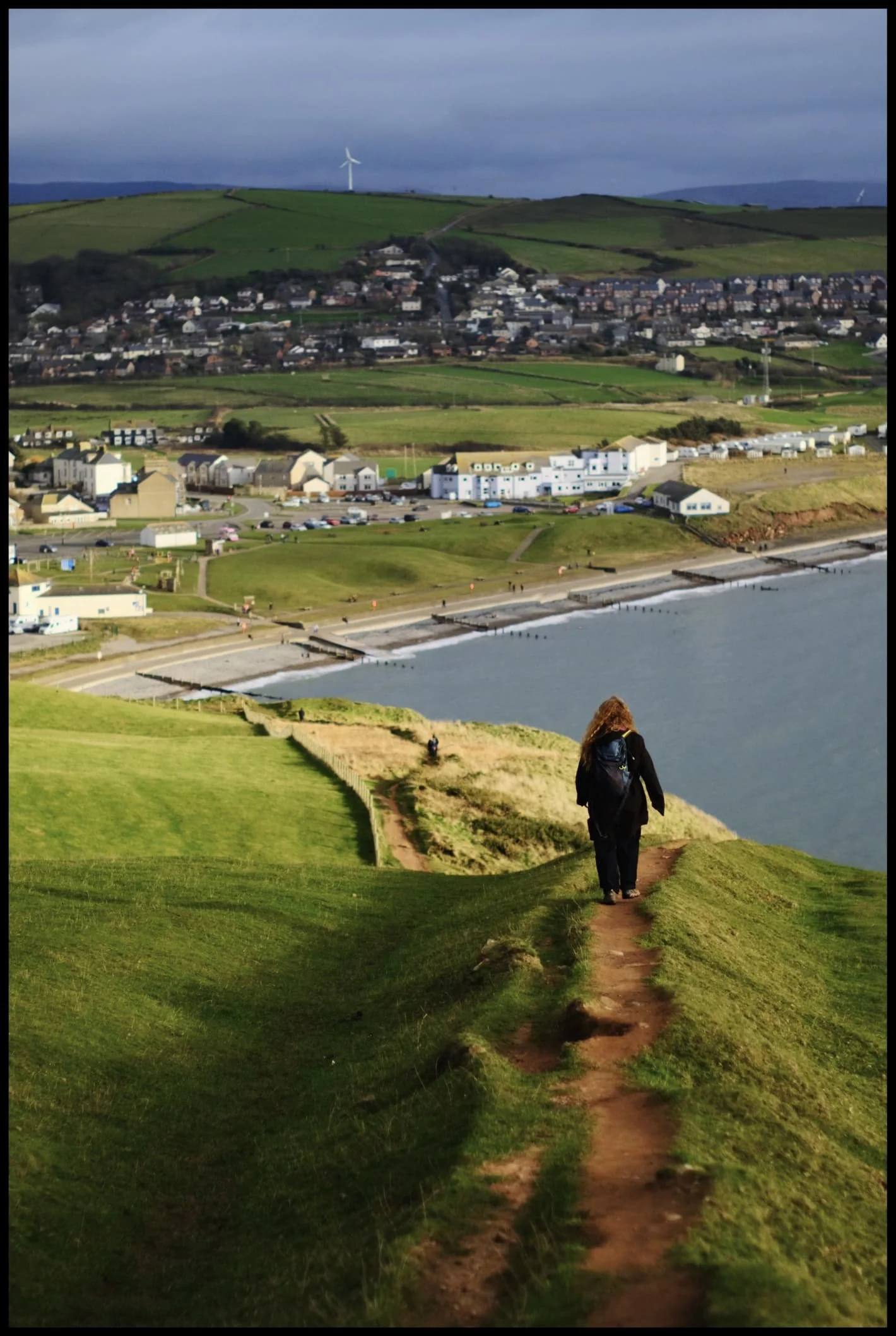  My lovely Lisabet, striding purposefully on towards St. Bees village as the sun bathed the land in light. 