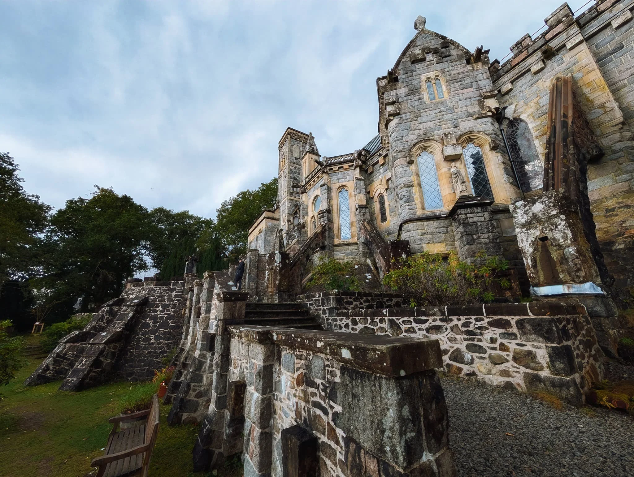  Moving outside, attention has further been made to the exterior of St. Conan&rsquo;s Kirk. The roof features three remarkable gargoyles crafted from lead.  These depict a dog chasing two hares and were created by William Bonnington, the same skilled craftsman who constructed the roofs of the Cloister Garth. Interestingly, his descendants still reside in the village. 