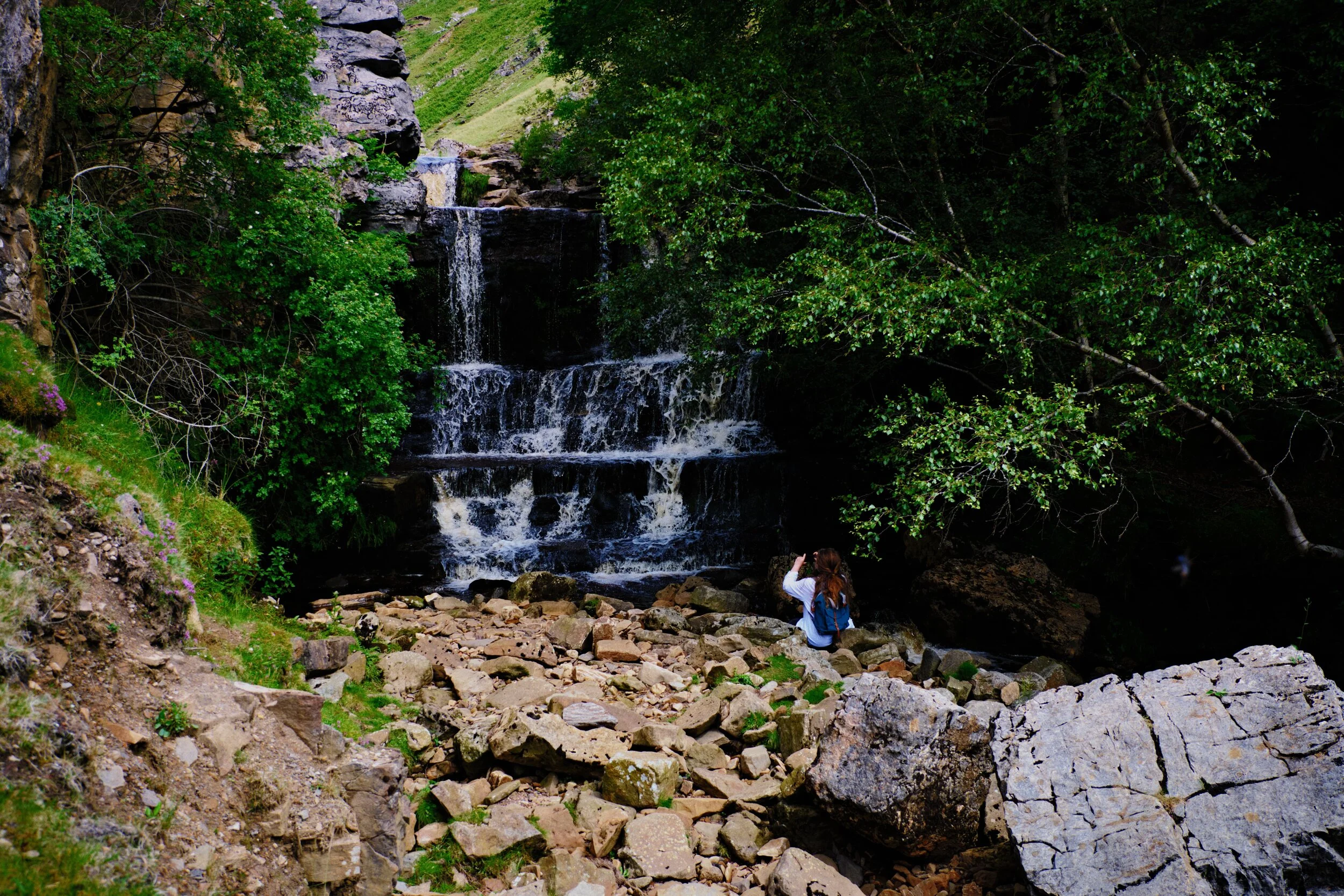  A lot of industry occurred in Swaledale during the 19th century, particularly lead mining. The fells around the valley are dotted with scars attesting to the industrial heritage of this area. It&rsquo;s also apparent here at Swinner Gill, where you can find the ruins of a mining hut right near this waterfall. I wonder if the water flowing down this ravine was once used to power industry. 