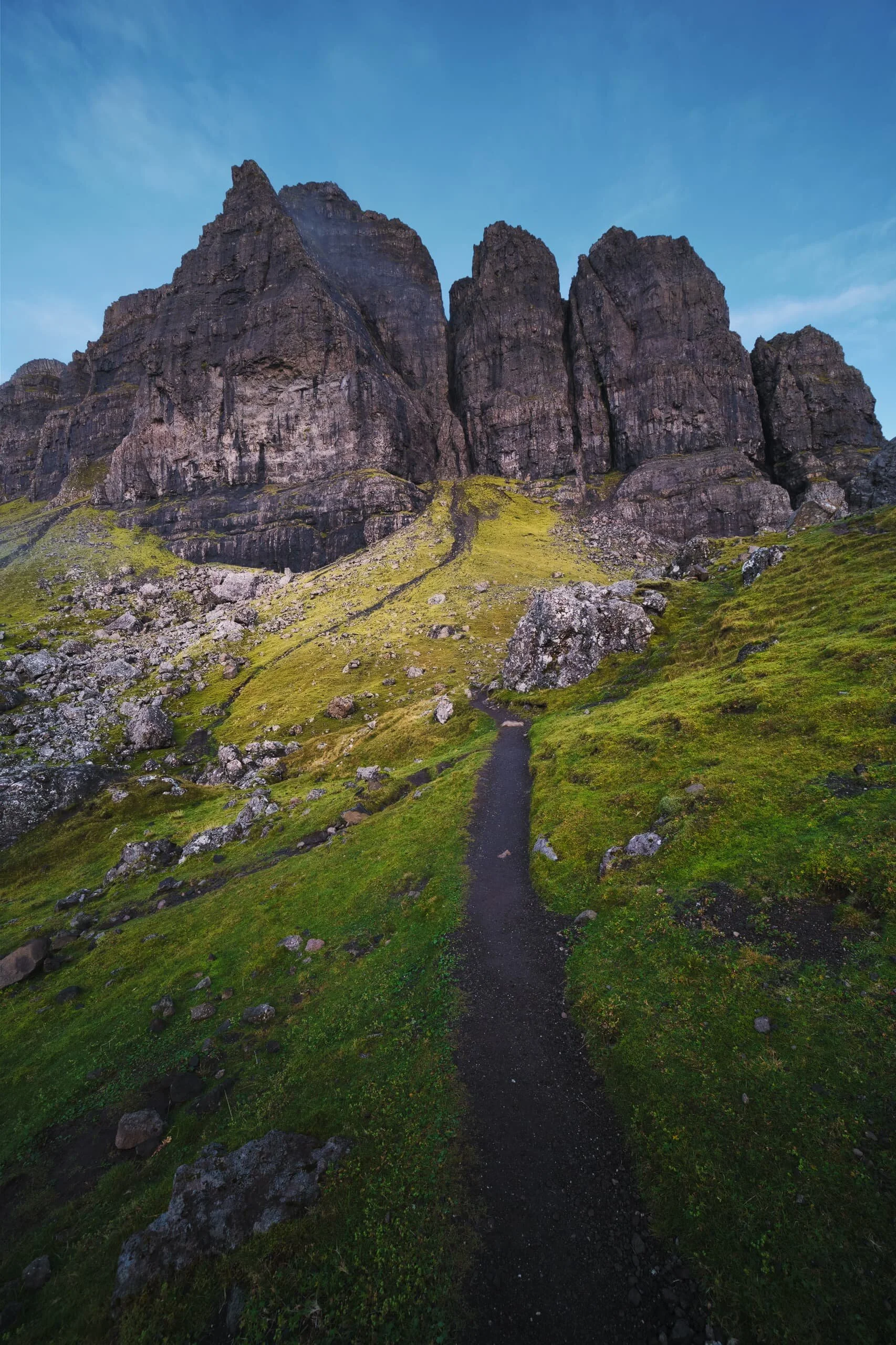  Getting closer to the cliffs of the Storr as the fog started to burn off from the rising sunlight. My aim was to take the path down to the left here, so I could get  behind  all the Sanctuary formations for a composition I had in mind. 