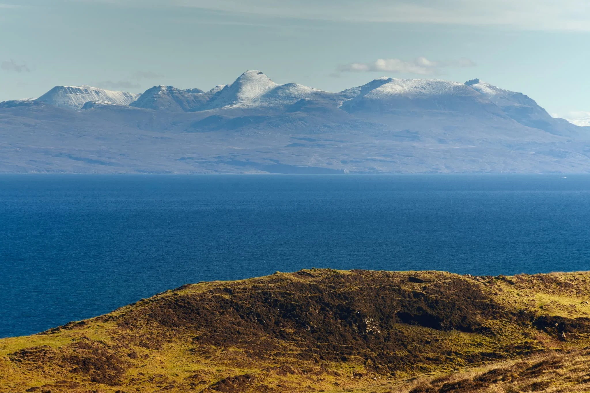  We were astounded when stopping at Flodigarry to see crystal clear views across the sea towards the Torridon mountains on the mainland. So clear you almost felt you could reach out and touch the mountains. 