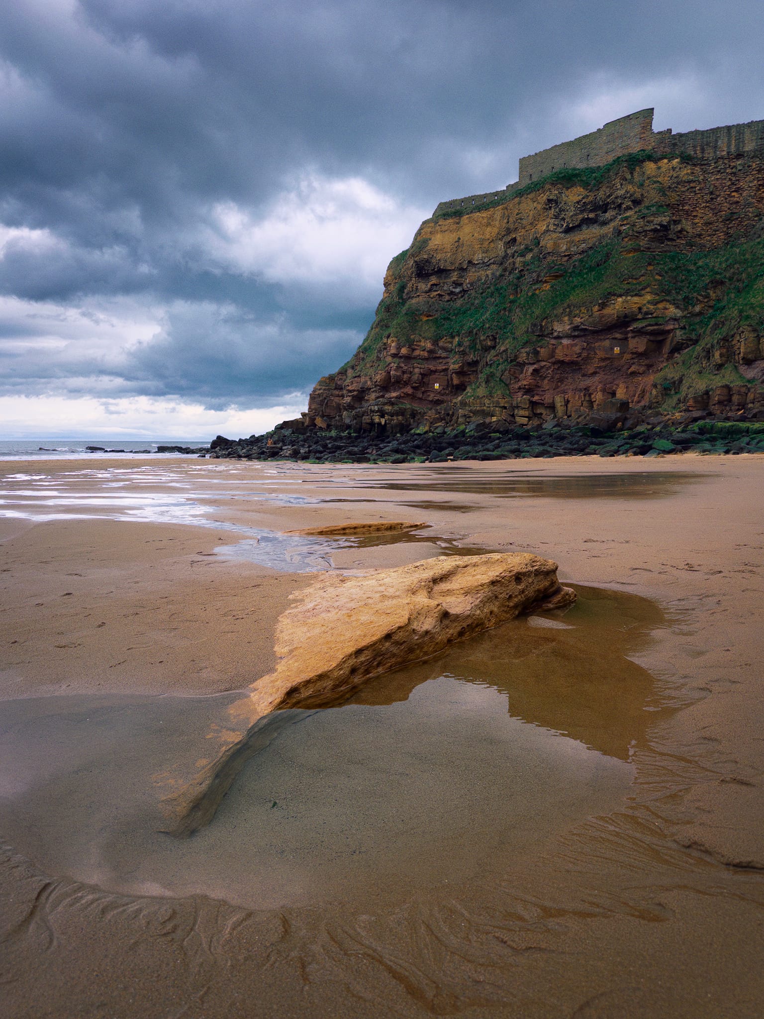 We immediately made our way onto the beach of King Edward’s Bay, with the imposing cliffs and Priory above us. The tide was out but it was due to come back in, which promptly caught me out was I got my shoes soaked not long after nabbing this photo.