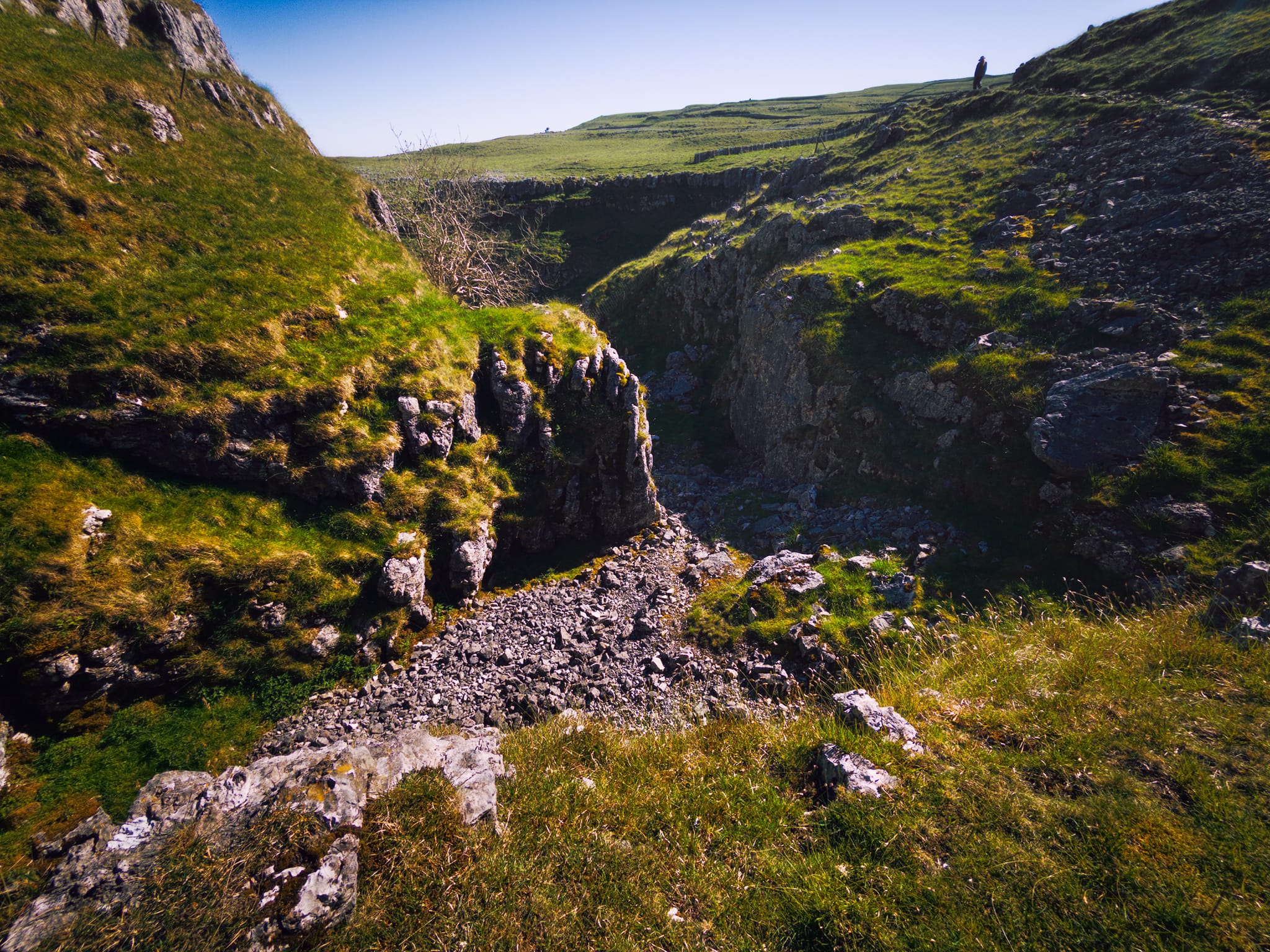 An ultra-wide perspective shows where the river would’ve crashed as a waterfall and twisted as it carved its way down the valley.