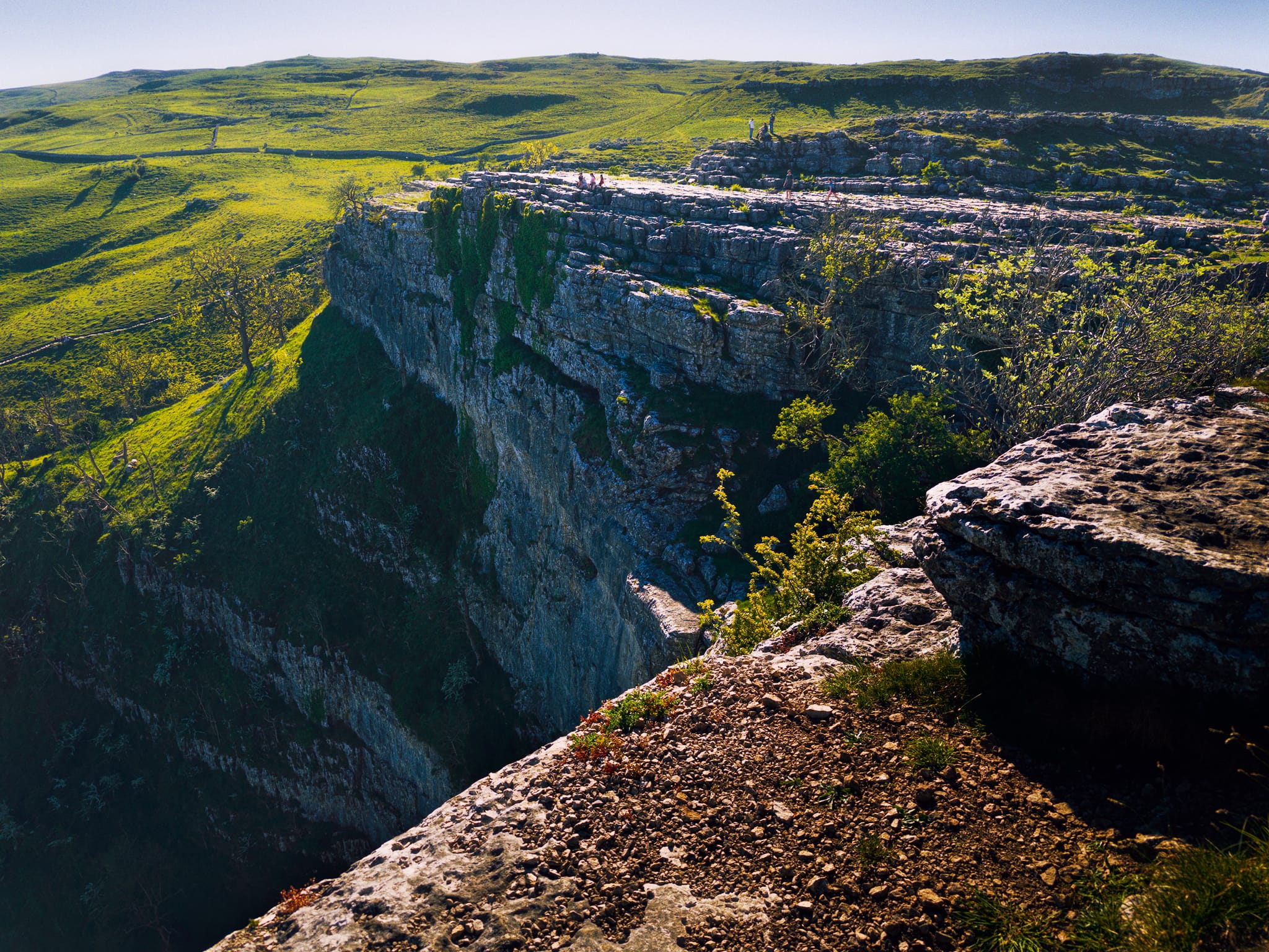 Looking across, and down, Malham Cove from its eastern edge. Imagine the sheer scale of the massive waterfall that would’ve dropped from here.