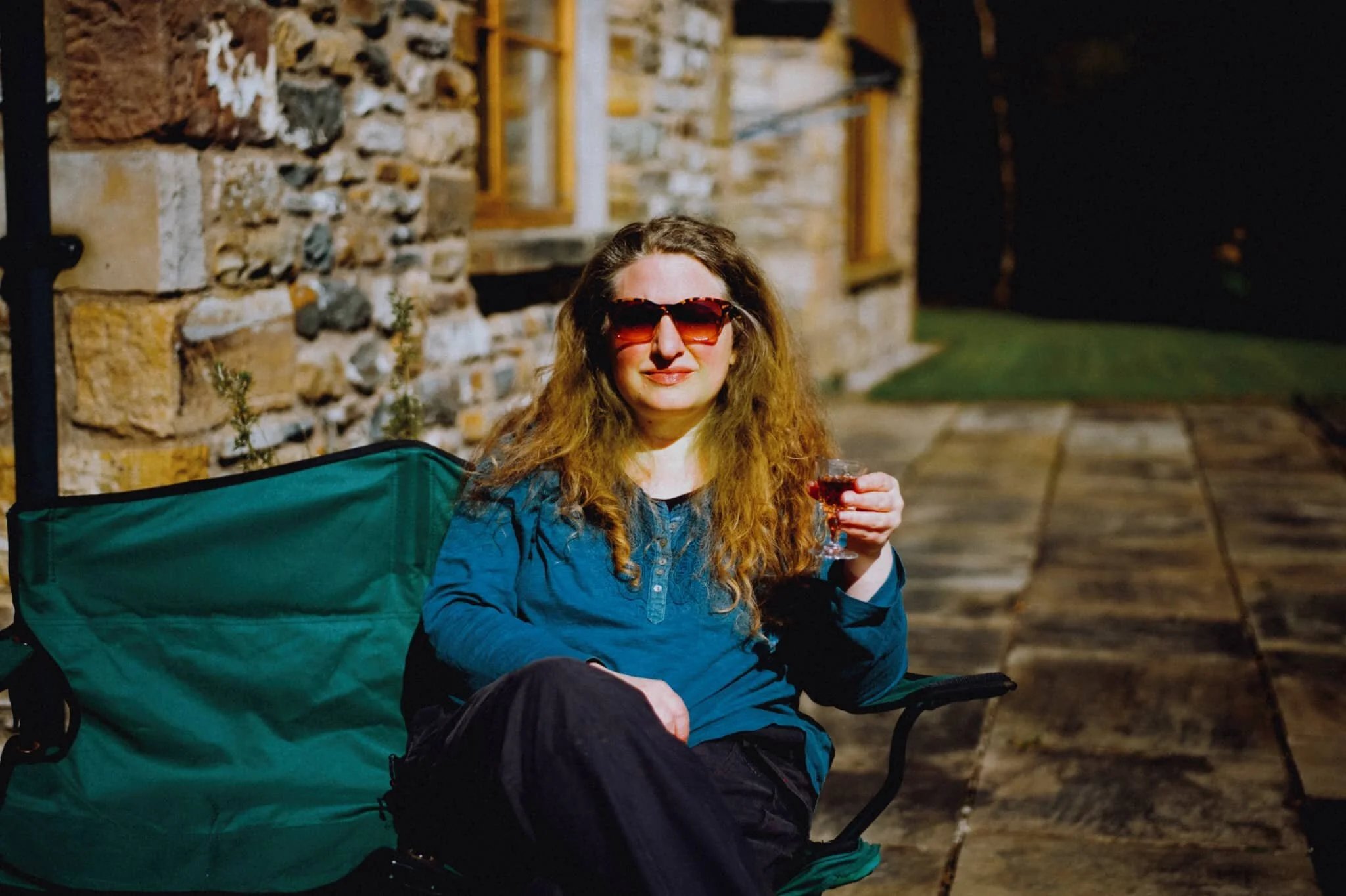  My lovely Lisabet, enjoying a drop of Sherry in her friend&rsquo;s garden post-walk. 