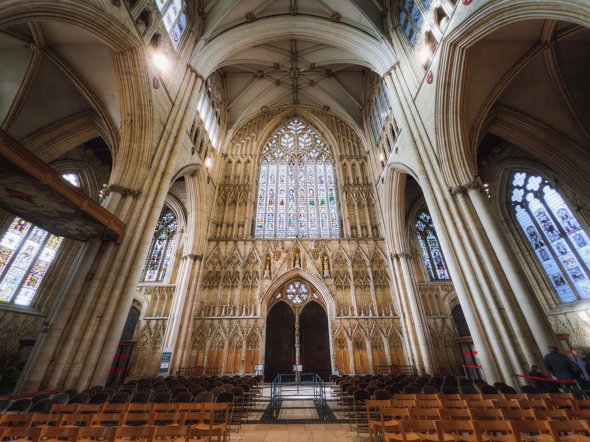  Looking towards the West Window in the Minster&rsquo;s main nave. The Great West Window, or &lsquo;Heart of Yorkshire&rsquo;—the church&rsquo;s second-largest of 128 windows—was built by master mason Ivo de Raghton in 1338–39 as part of the west front. 